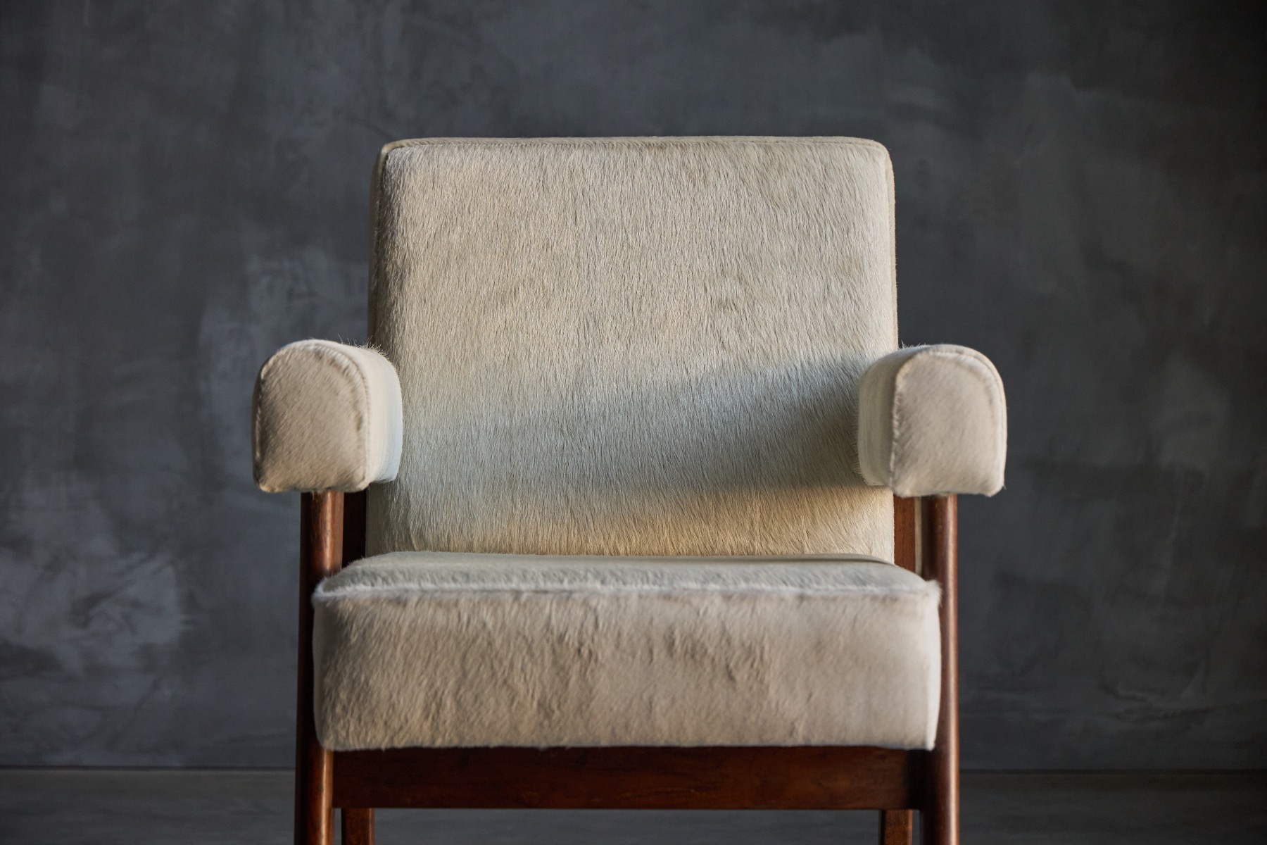 Iconic bridge chair created by Le Corbusier and Pierre Jeanneret