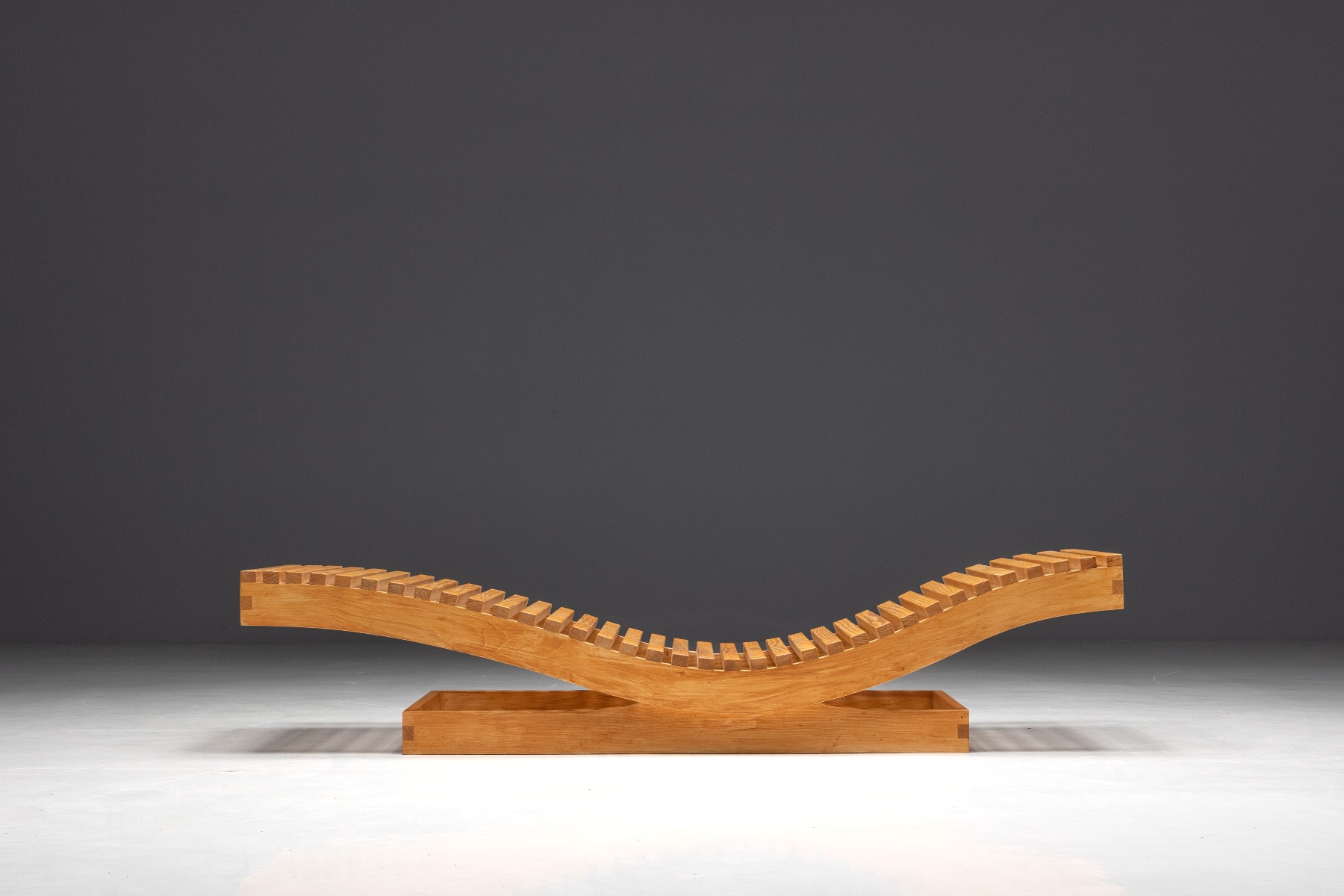 1970s lounge chair by Maison Regain with wood frame