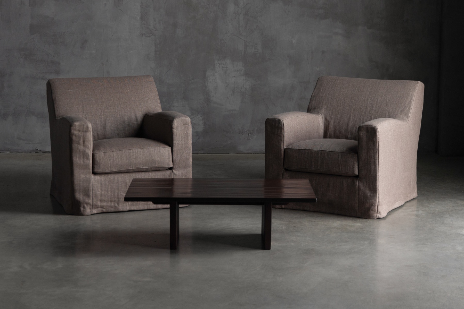 1990s lounge chairs reflecting Christian Liaigre aesthetics