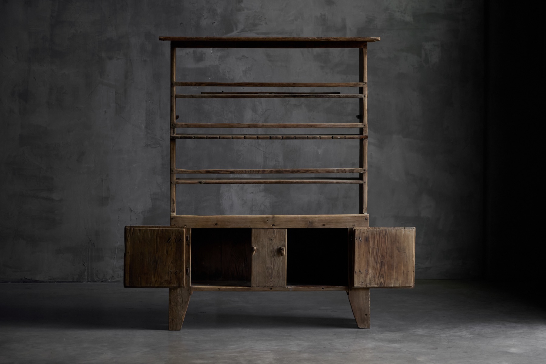 Primitive wooden storage cabinet dating to the 19th century