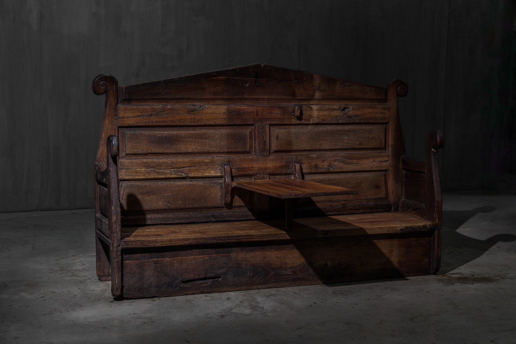 Antique monastic bench crafted in solid wood