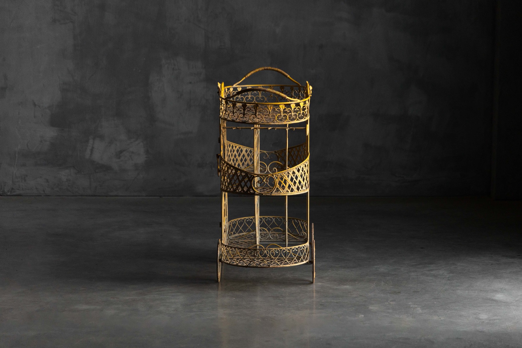 Antique iron serving trolley on wheels dating to the early 1900s