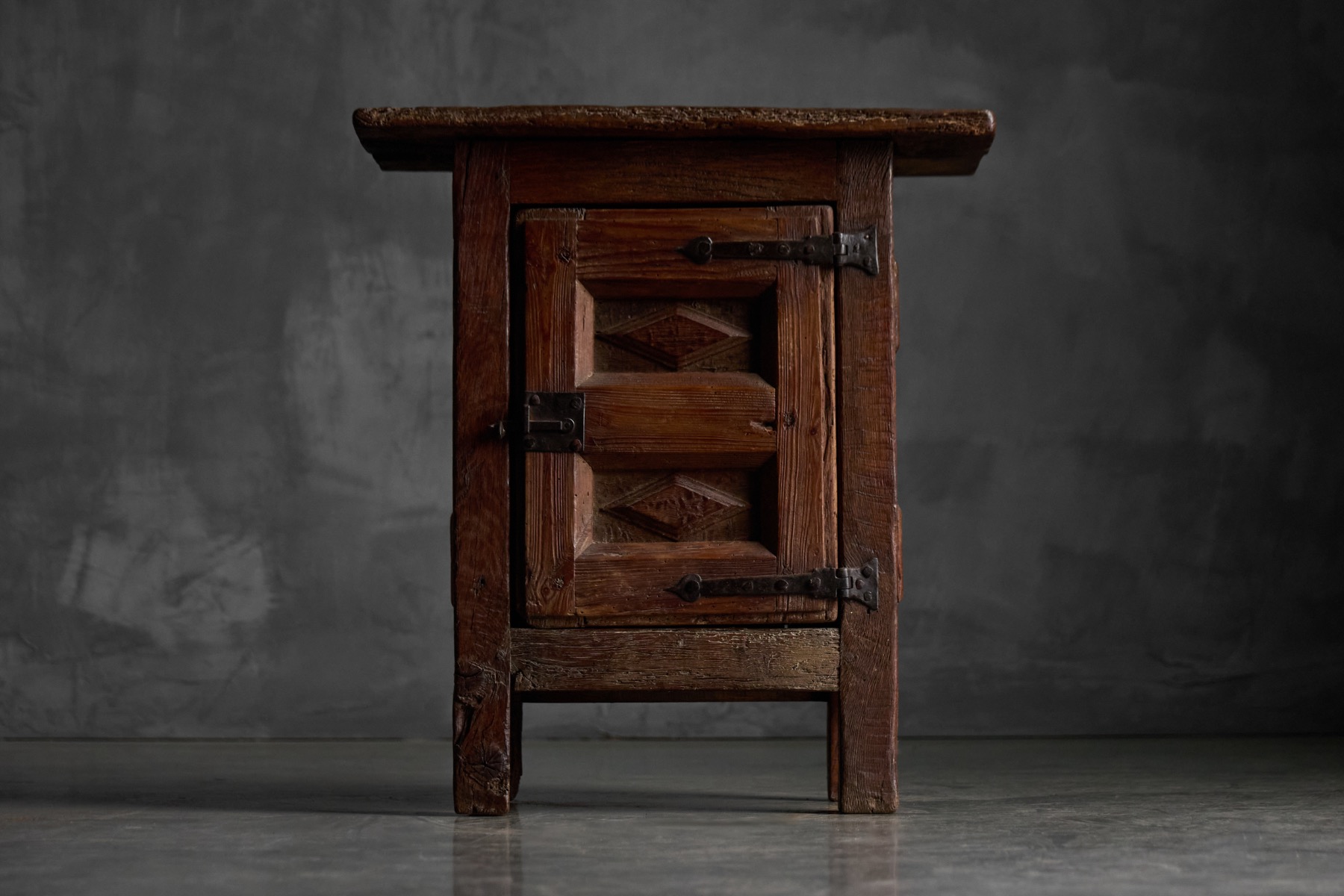 Antique oak storage cabinet with classic rustic character