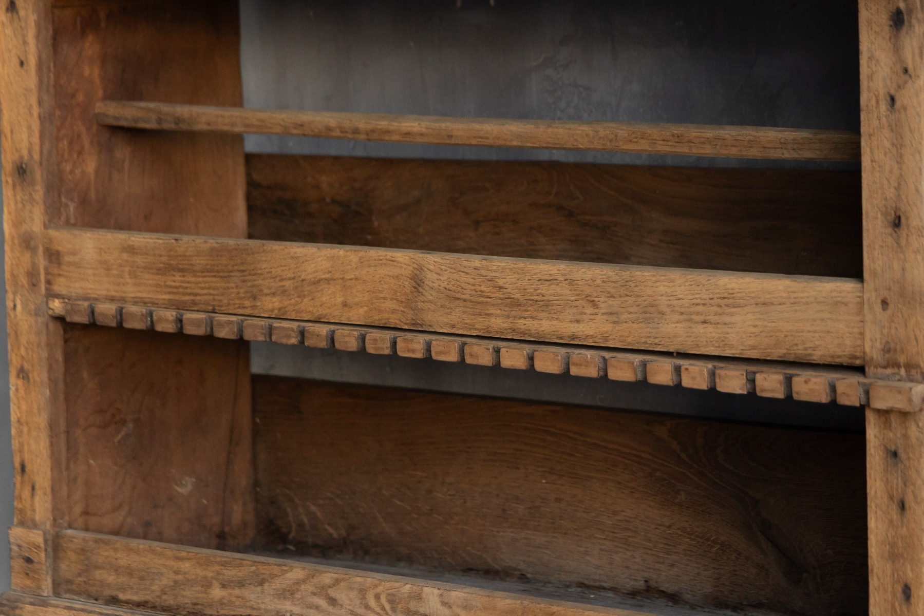 Art Populaire wall mounted shelf featuring utilitarian open storage