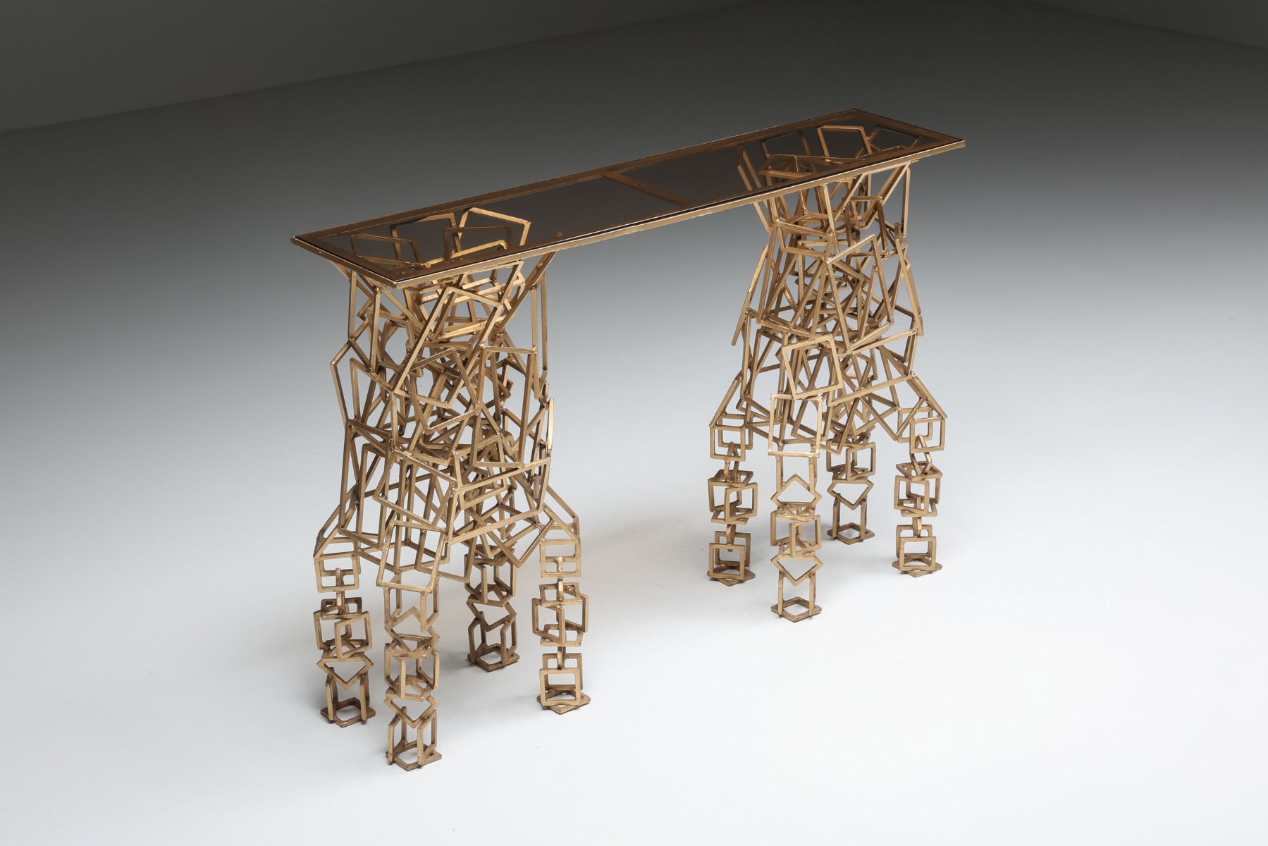 Artisan console table in gilded iron style