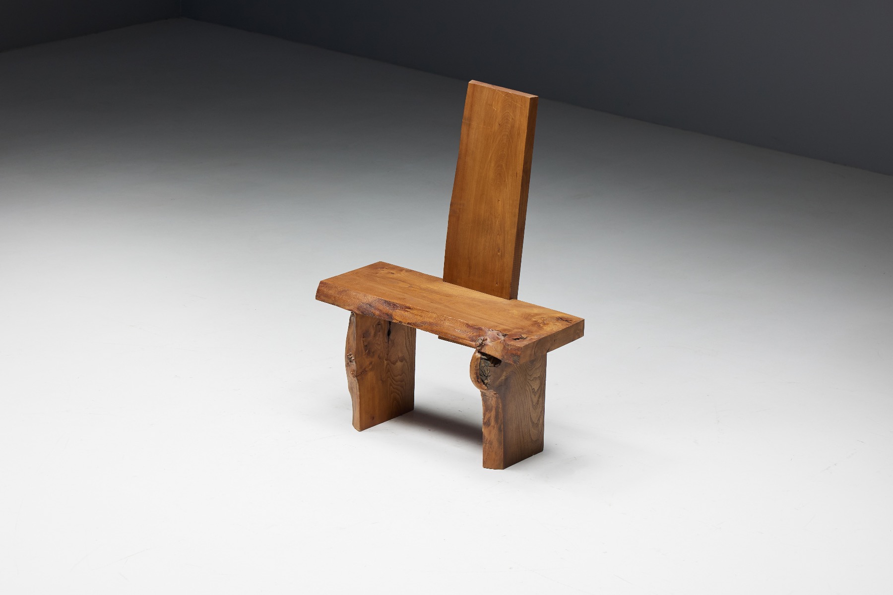 Brutalist organic chair in monoxylite material