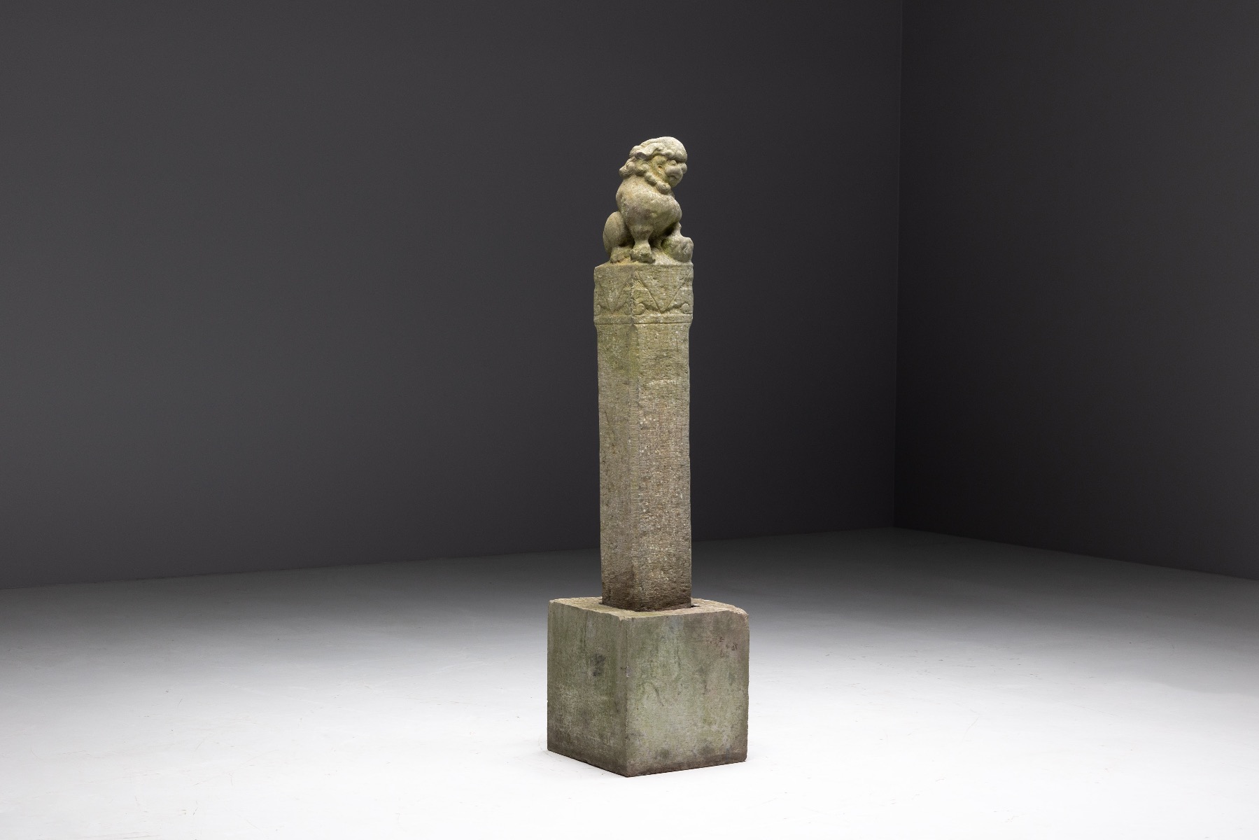 Carved Chinese guardian statue in stone
