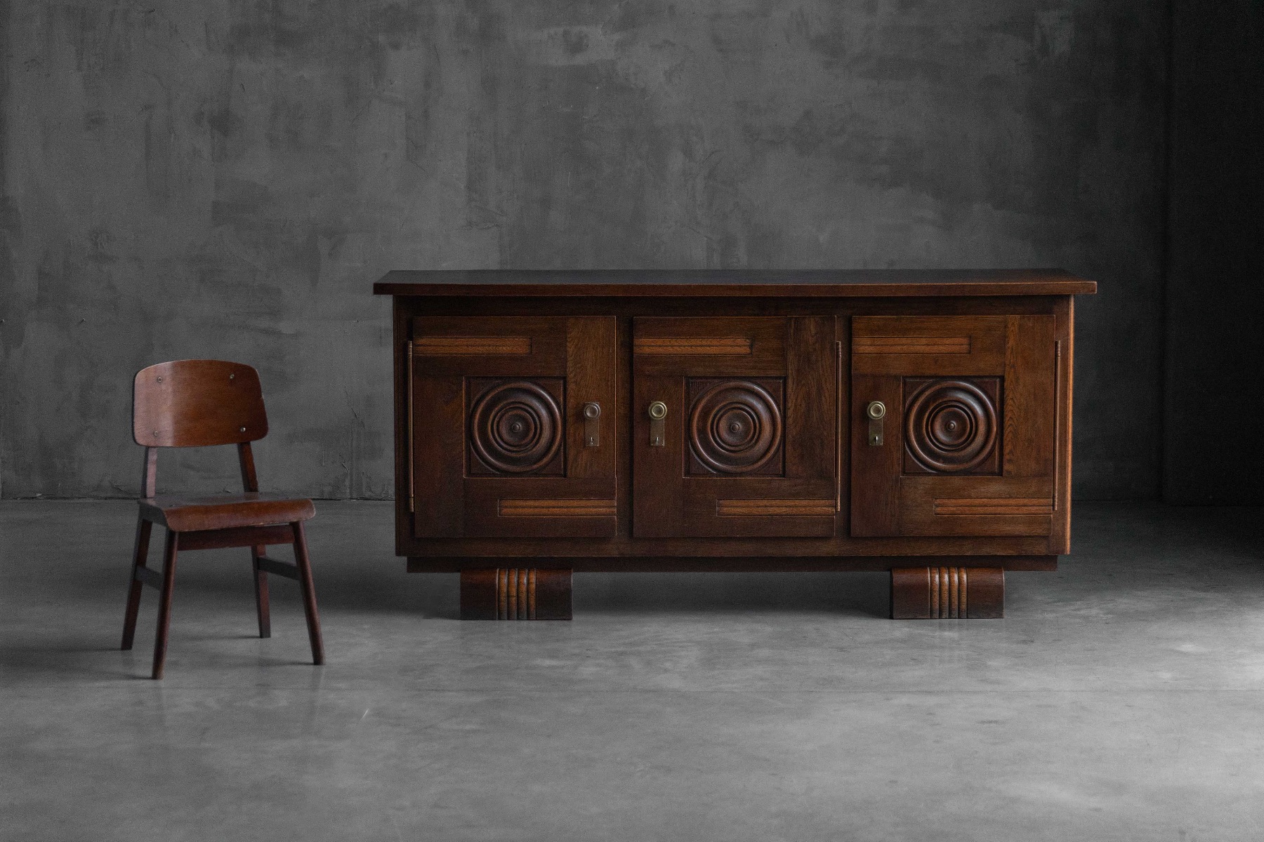Charles Dudouyt sideboard with circular carved motifs