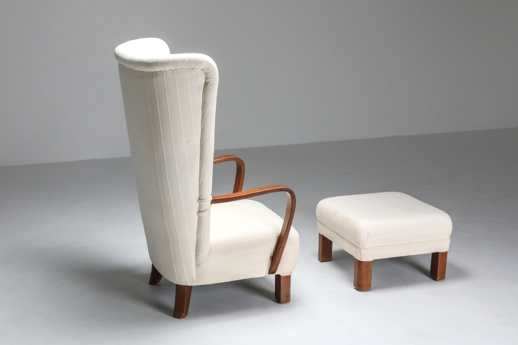 Classic wingback chair with ottoman mid century from the 1950s