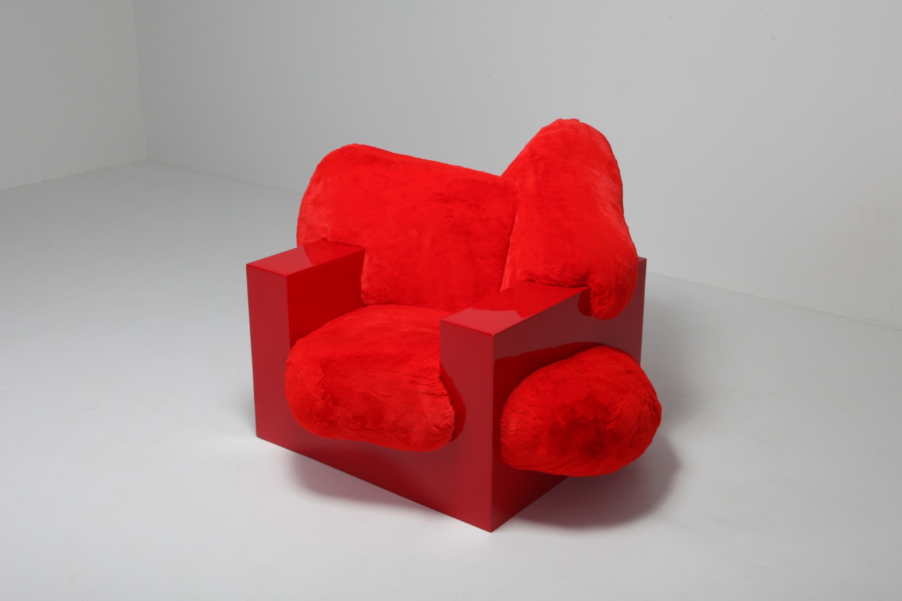 Designer pillow lounge chair by Schimmel Schweikle in red lacquer