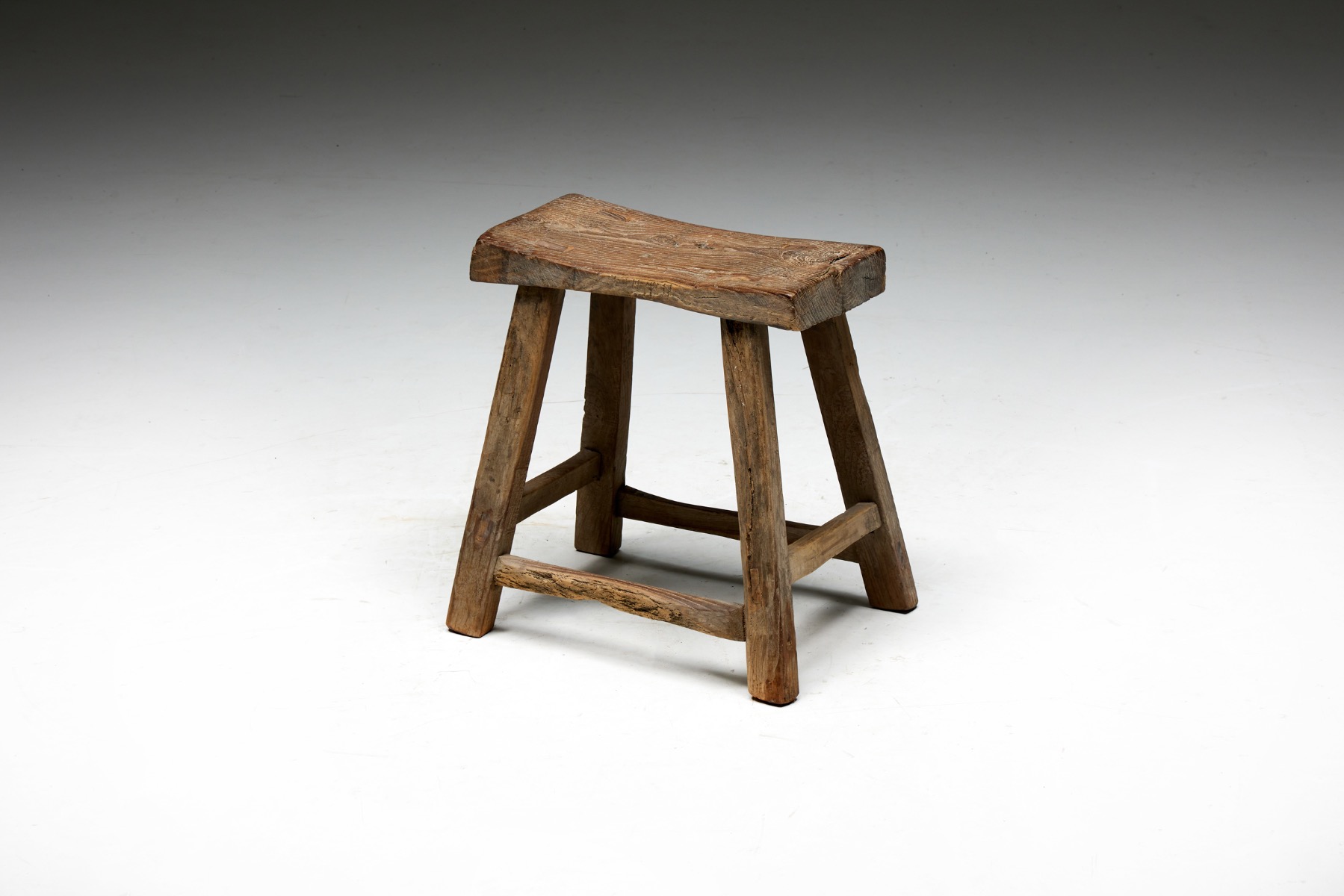 Early twentieth century French rustic stool in wood