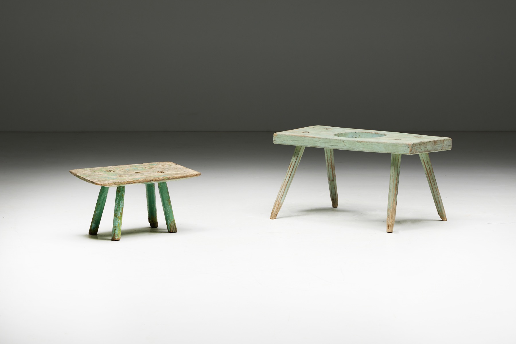 Early twentieth century rustic French side tables in wood