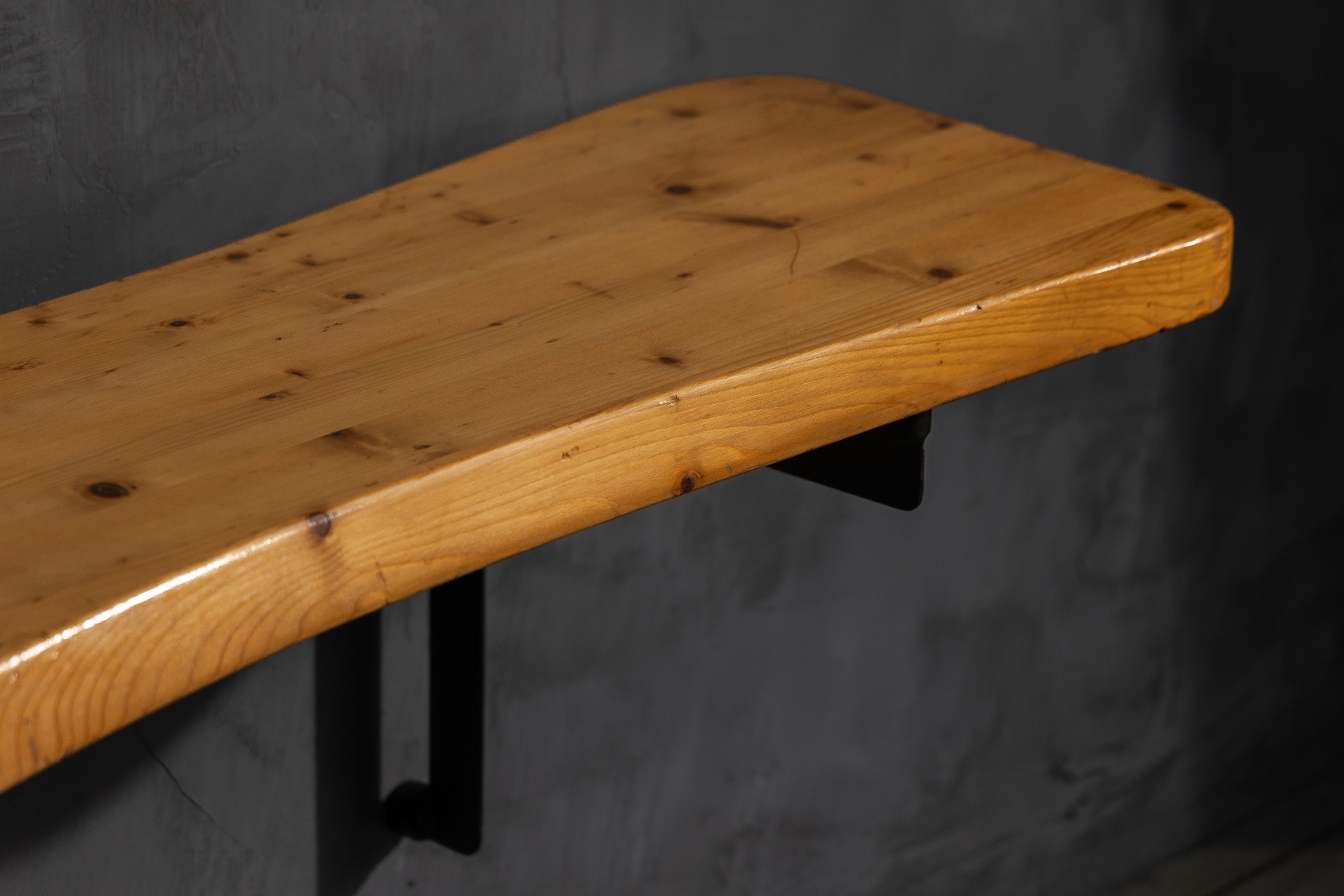 Wood console table with sculptural simplicity designed by Charlotte Perriand 