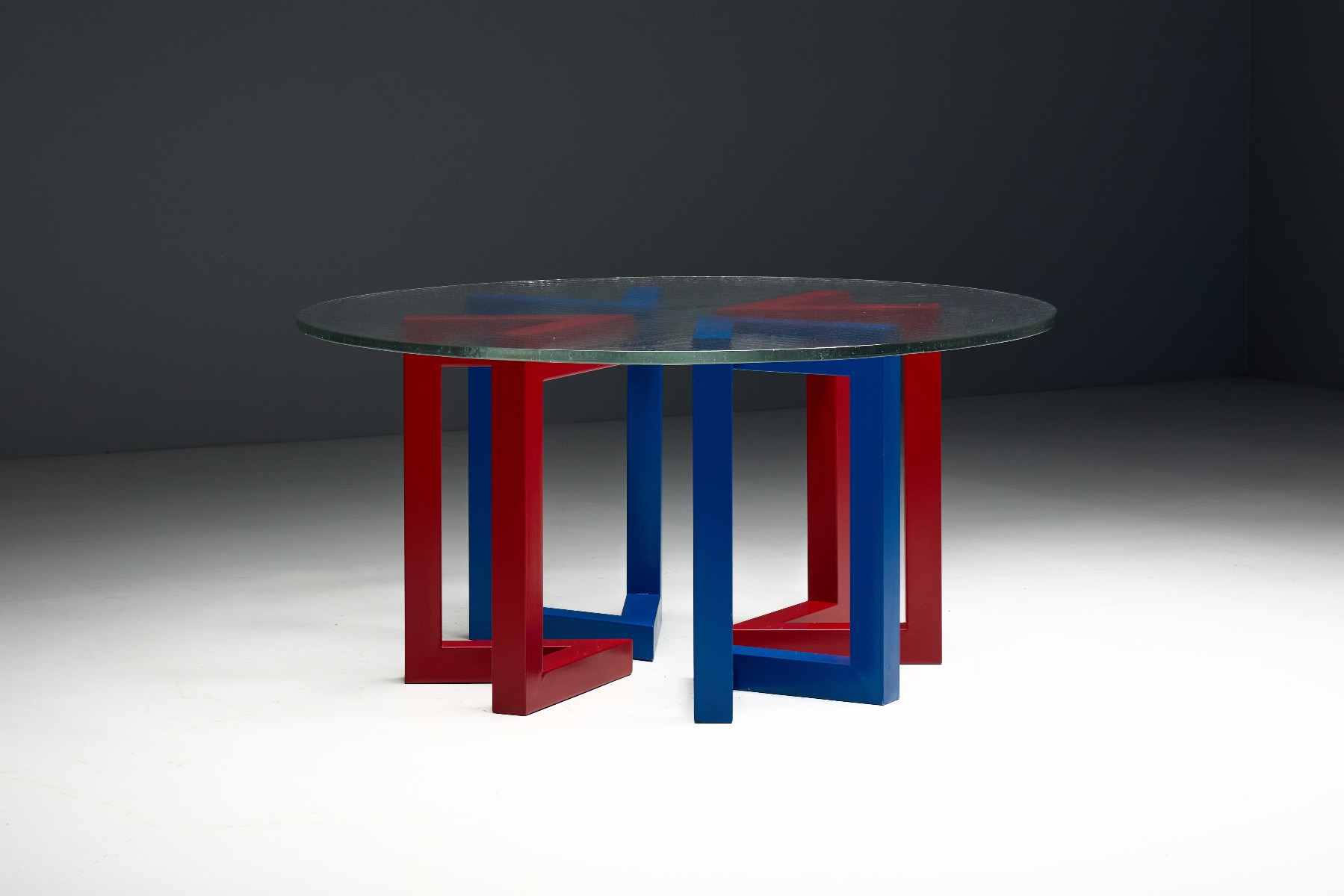 Artistic dining table with hand blown glass top