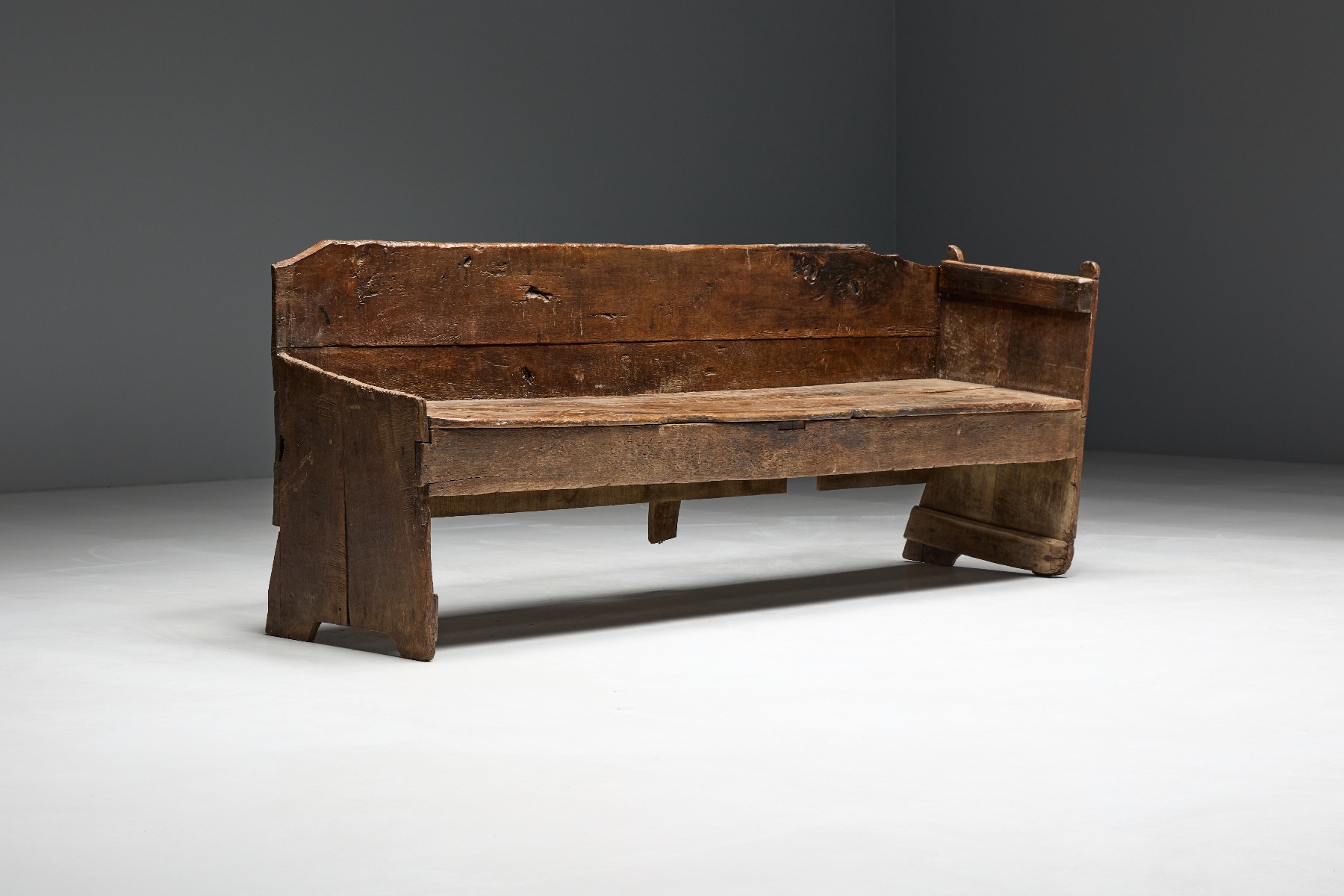 Handcrafted vernacular bench in aged timber