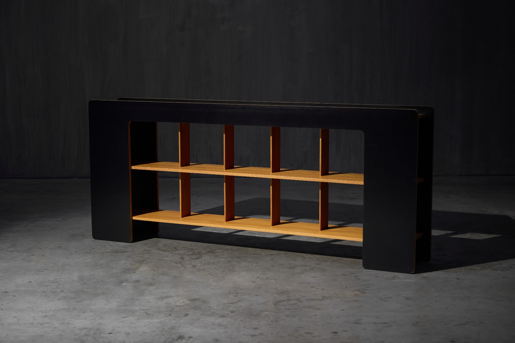 Sculptural postmodern bookcase with geometric structure