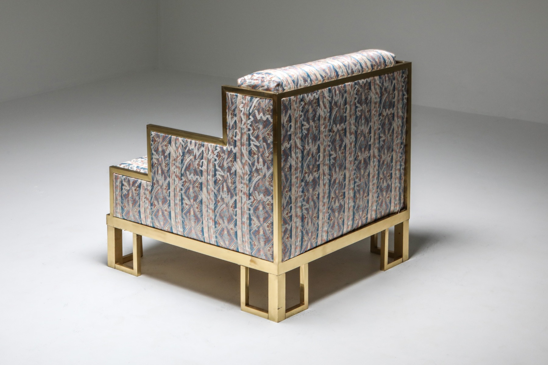Italian style brass lounge chair and ottoman from the 1970s