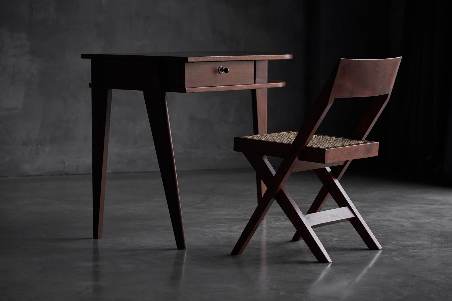 Jacques Adnet 1950s oak desk featuring a sculptural three leg base