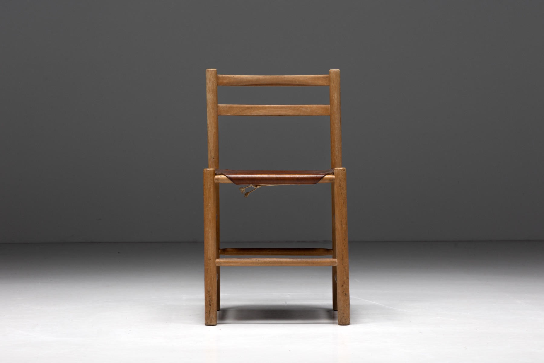 Mid century French dining chairs in wood and leather