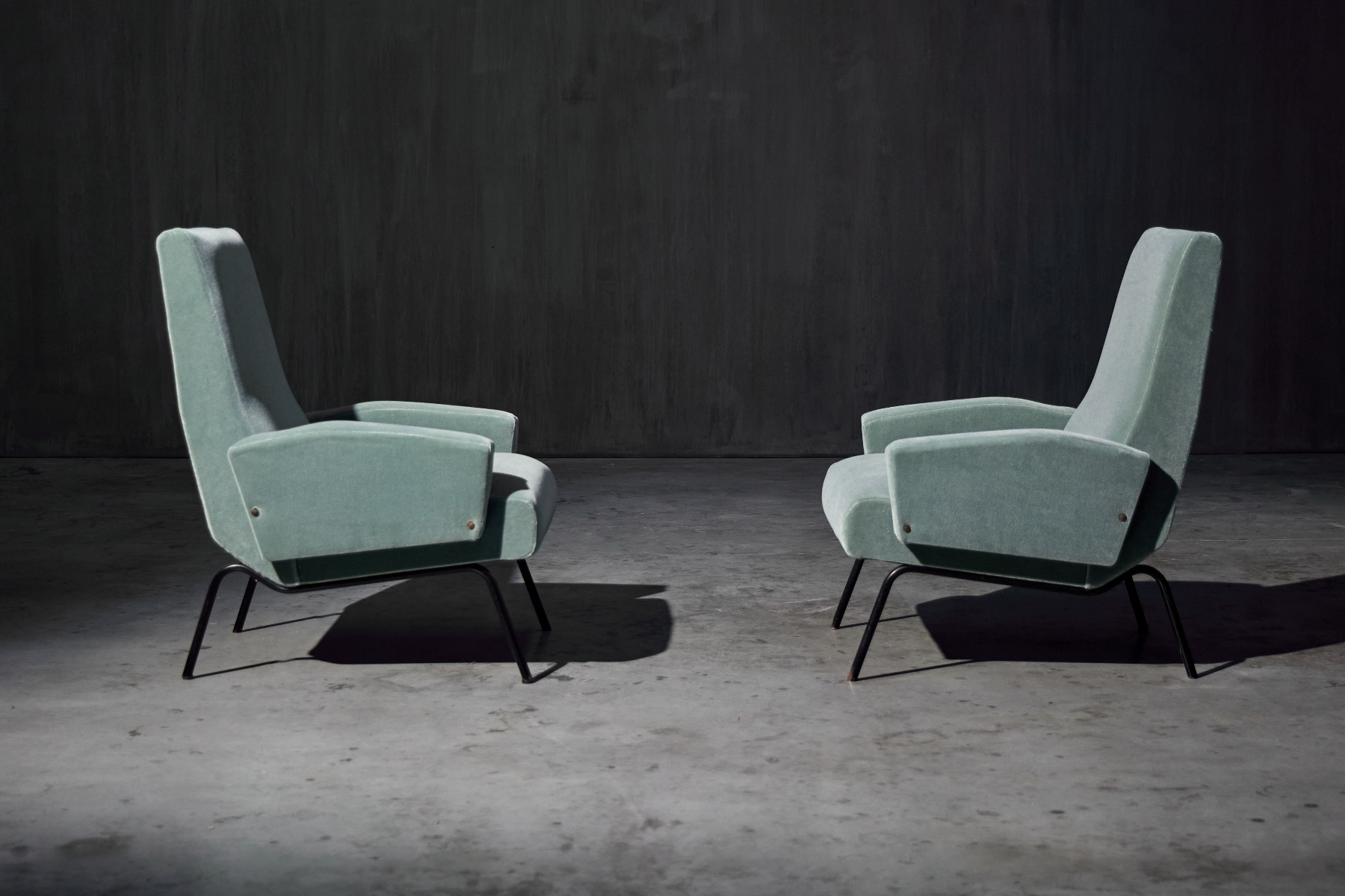 Vintage lounge chairs reflecting Rinaldi design influence