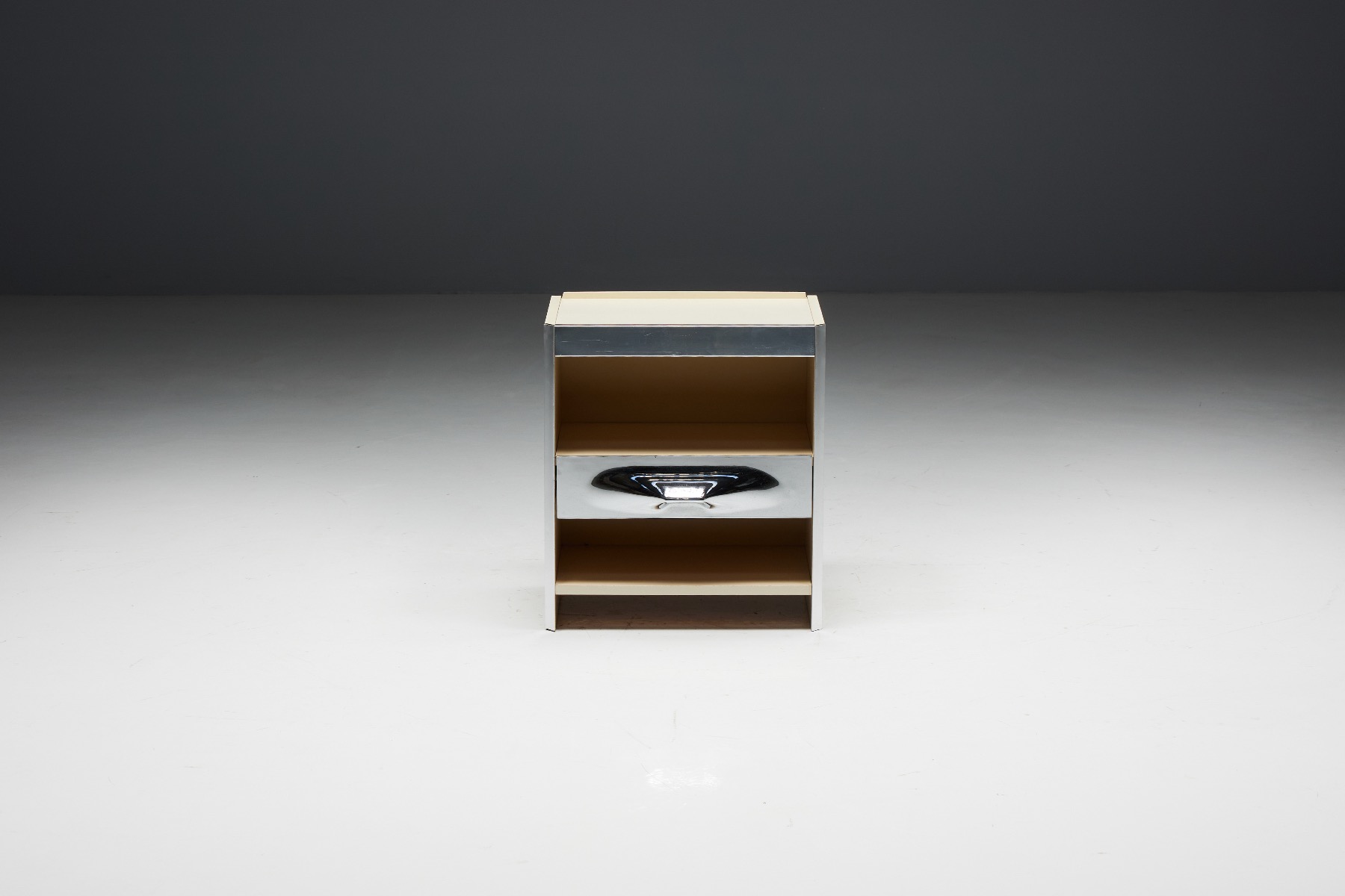 Mid century modern bedside table by Raymond Loewy from the 1960s