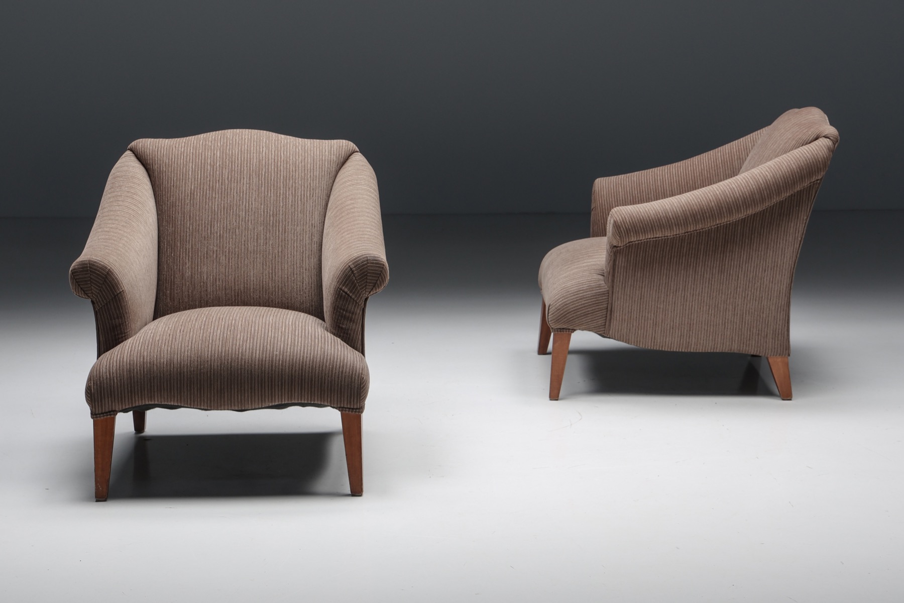 Mid century upholstered armchair in striped style