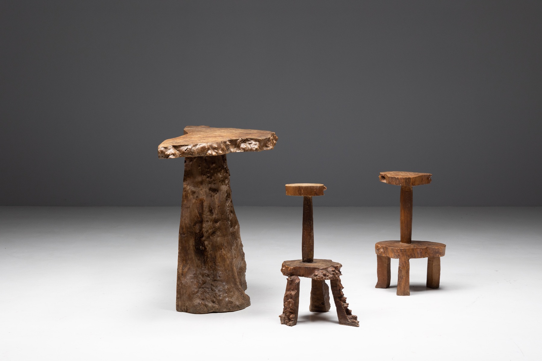 Monoxylite bar stools and table from the 1950s