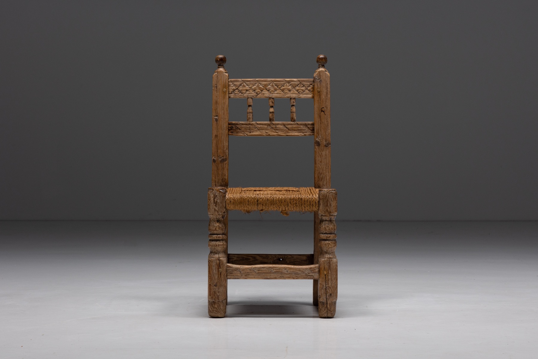 Nineteenth century rustic dining chairs with straw seats