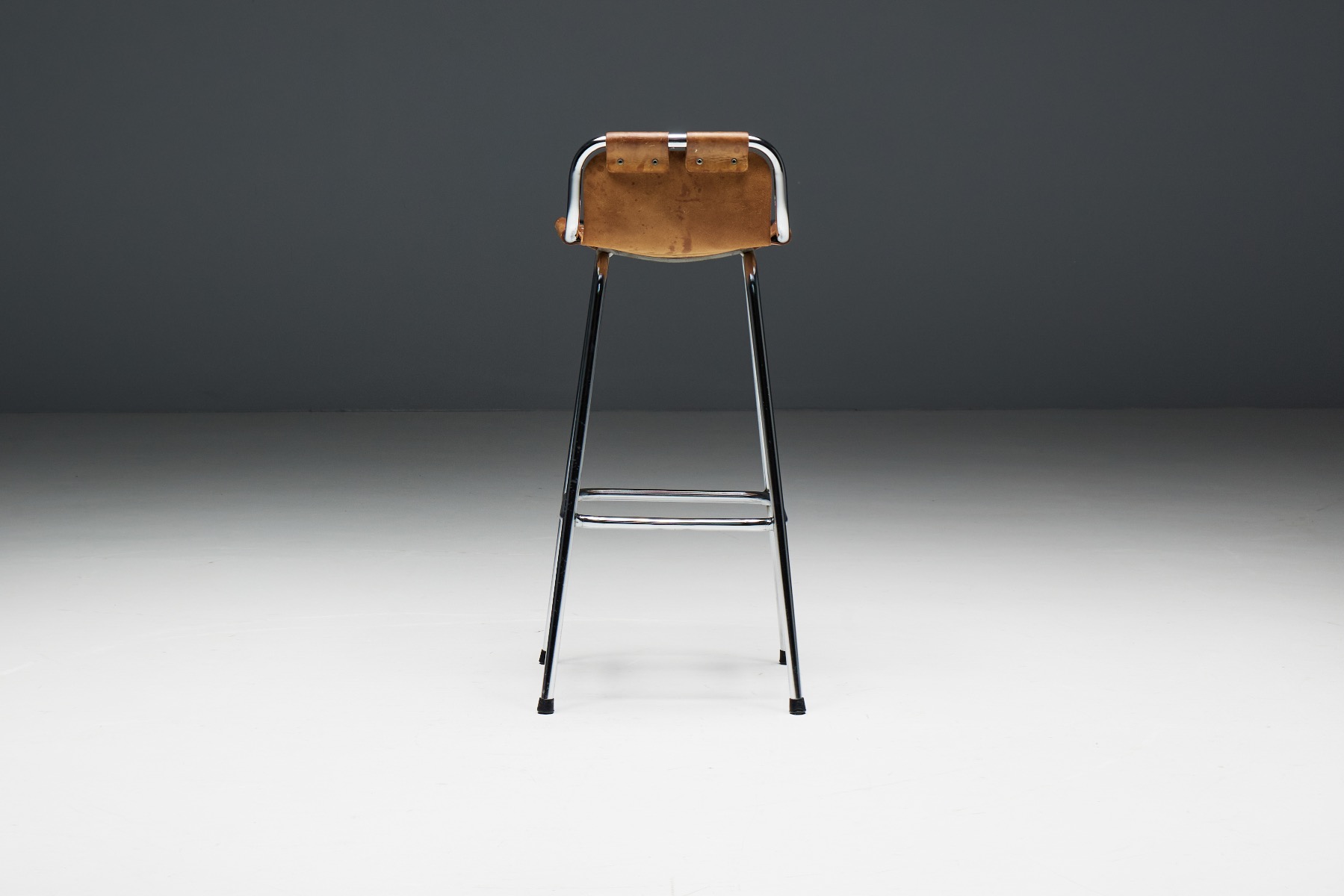 Modernist bar stools by Charlotte Perriand