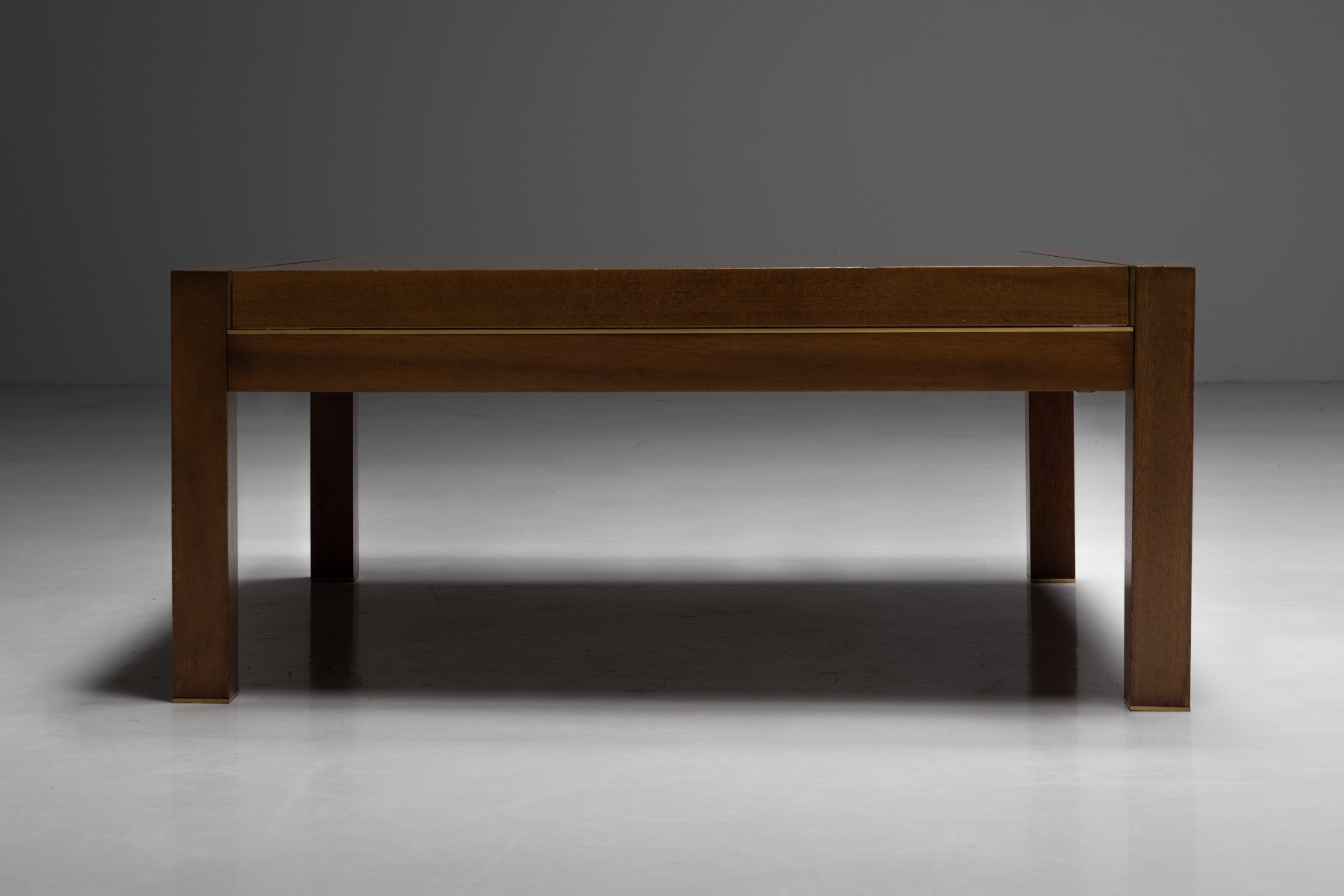 Postmodern coffee table in walnut and brass by Pierre Balmain