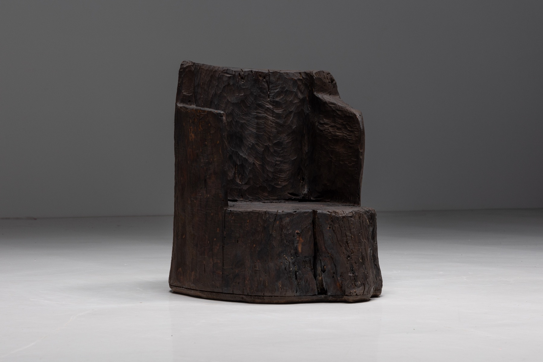 Postmodern monoxylite armchairs in brutalist look
