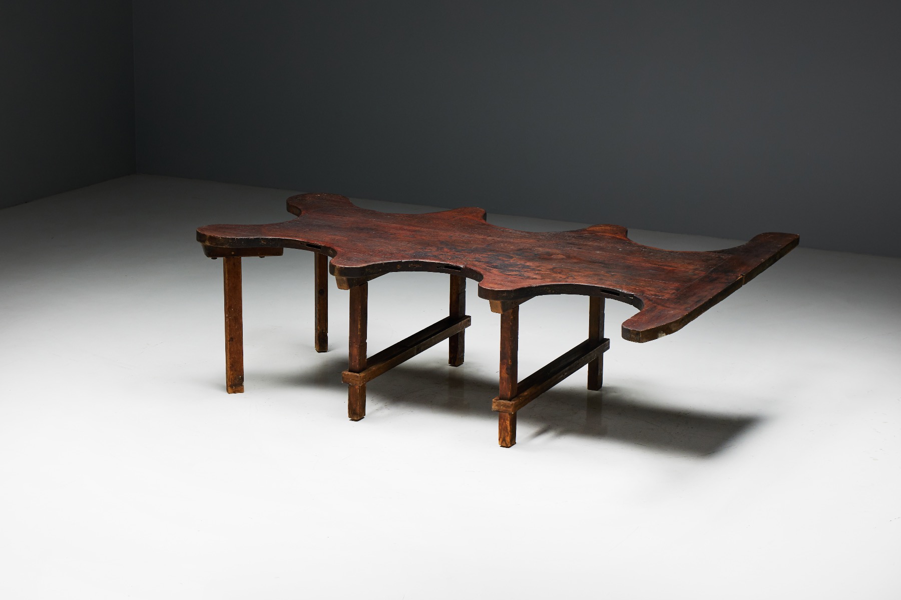 Primitive organic table in solid wood construction