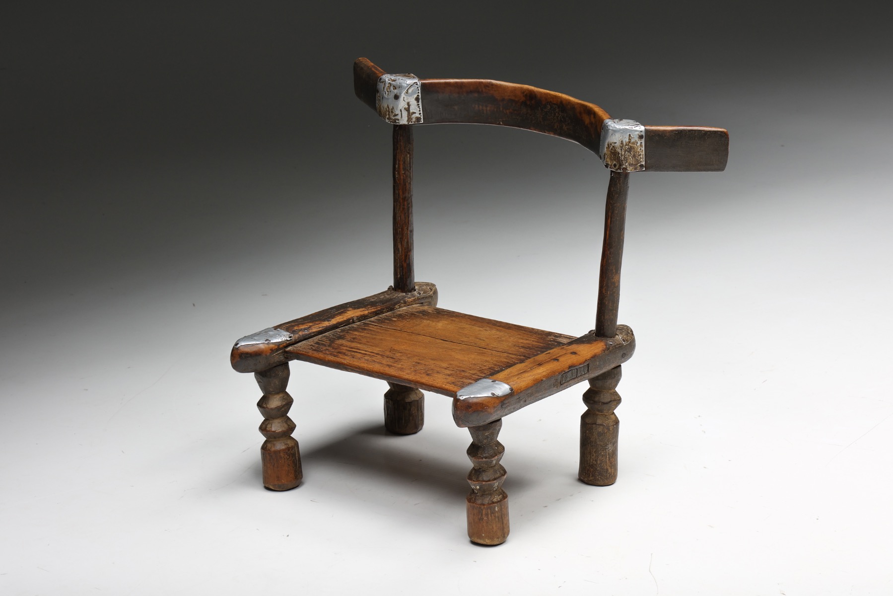 Primitive sculptural chair in wood wabi design