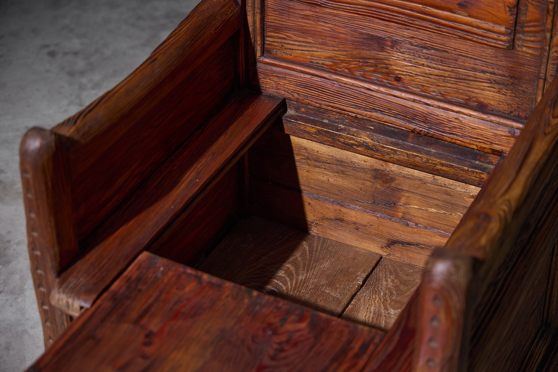 Primitive 19th century armchair with concealed storage