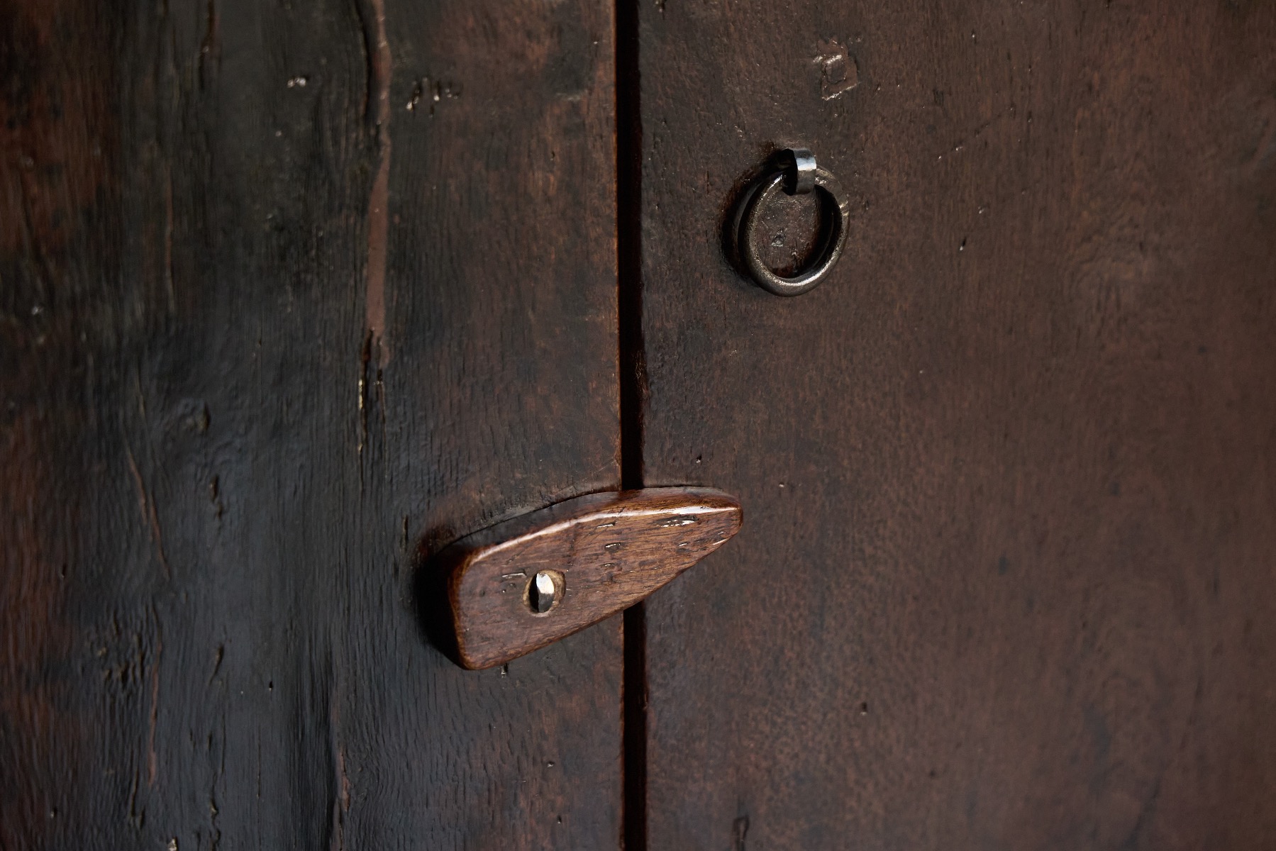 Primitive handcrafted storage cabinet with rustic character