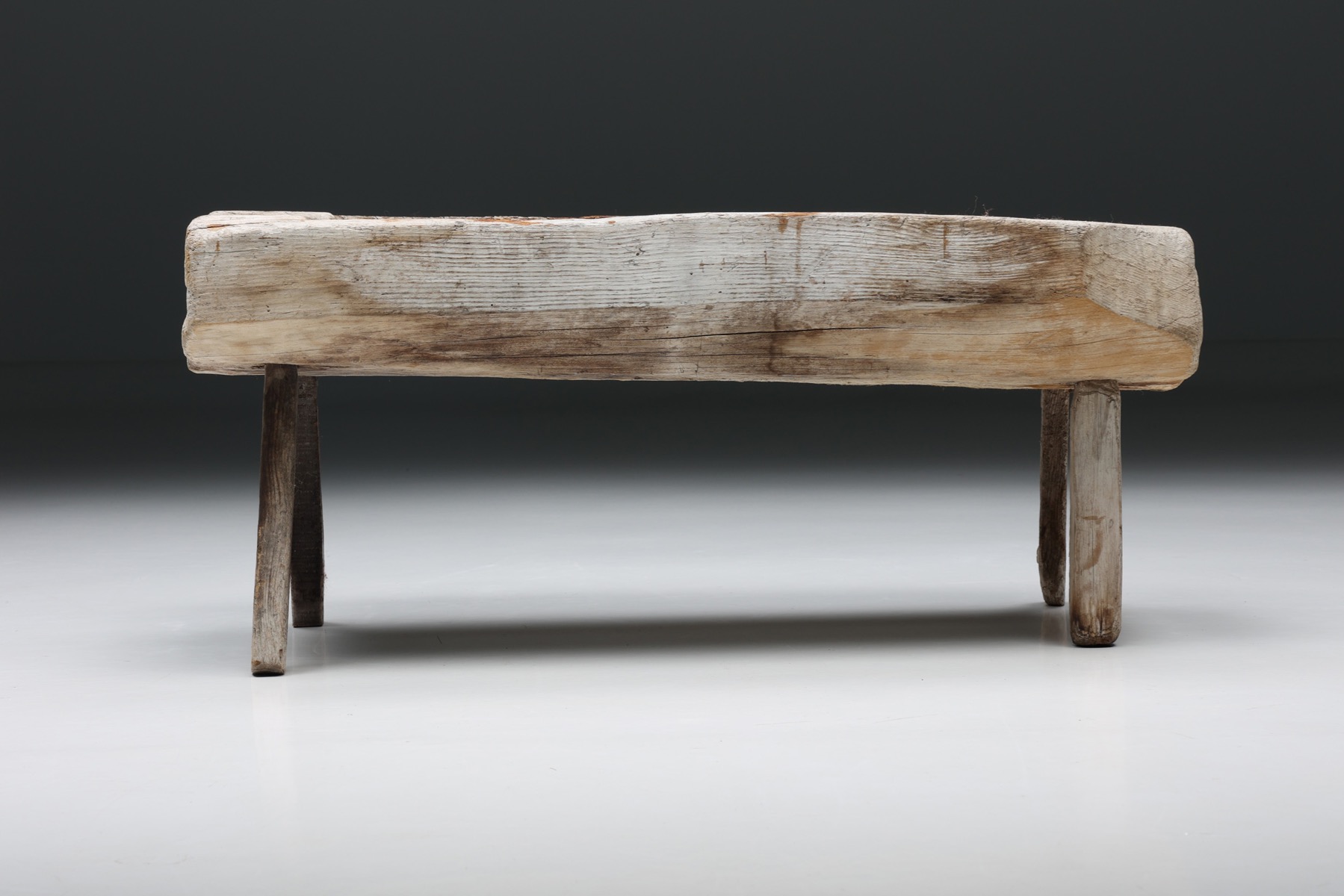 Primitive wooden trough in wabi sabi style