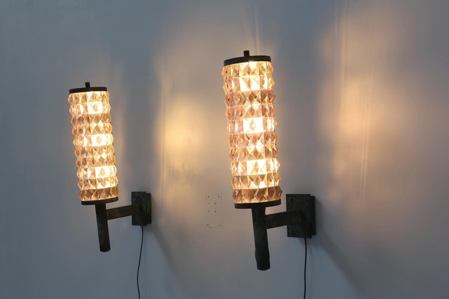 Retro wall sconces in art deco iron and glass style