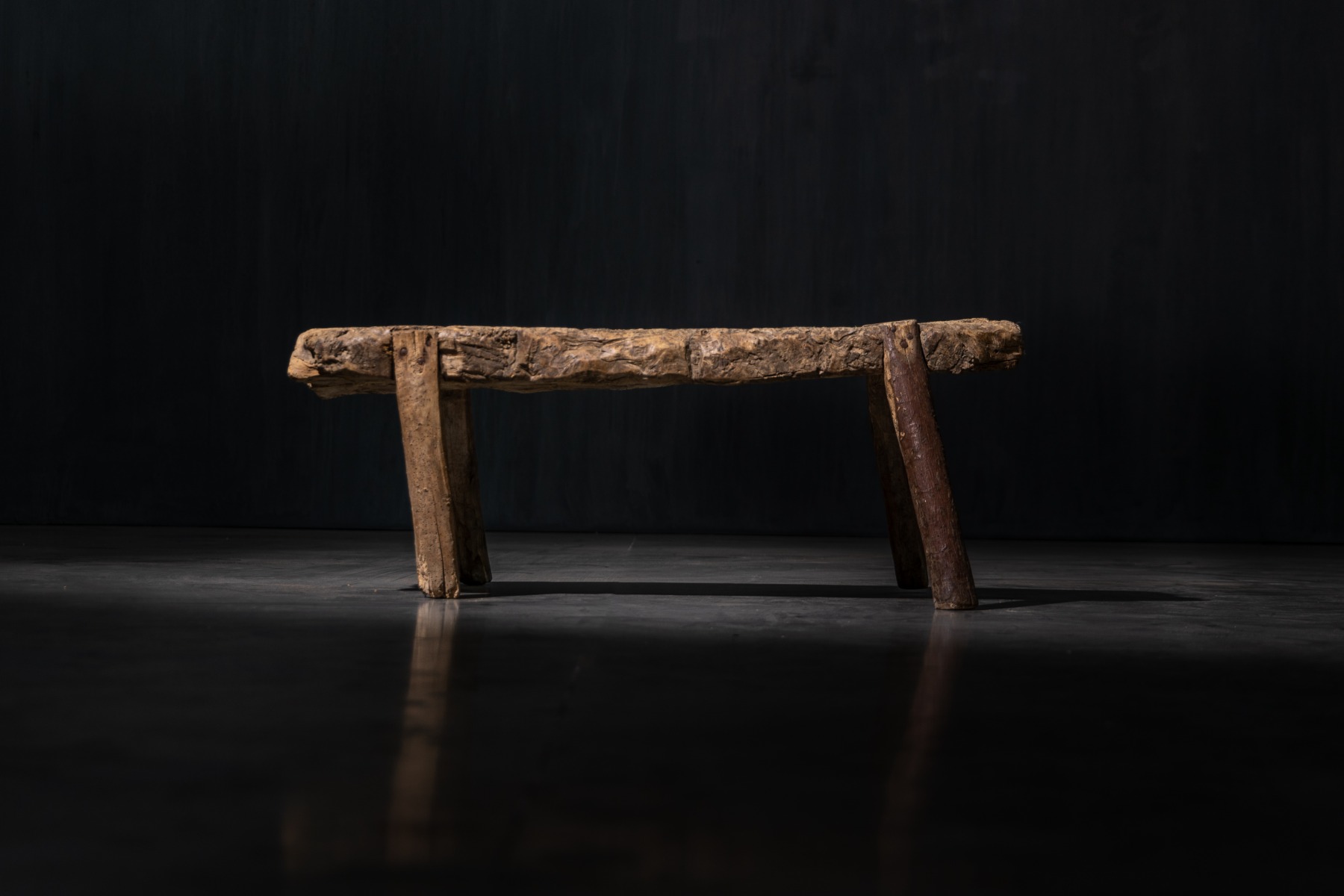 Handcrafted wooden bench with traditional carving