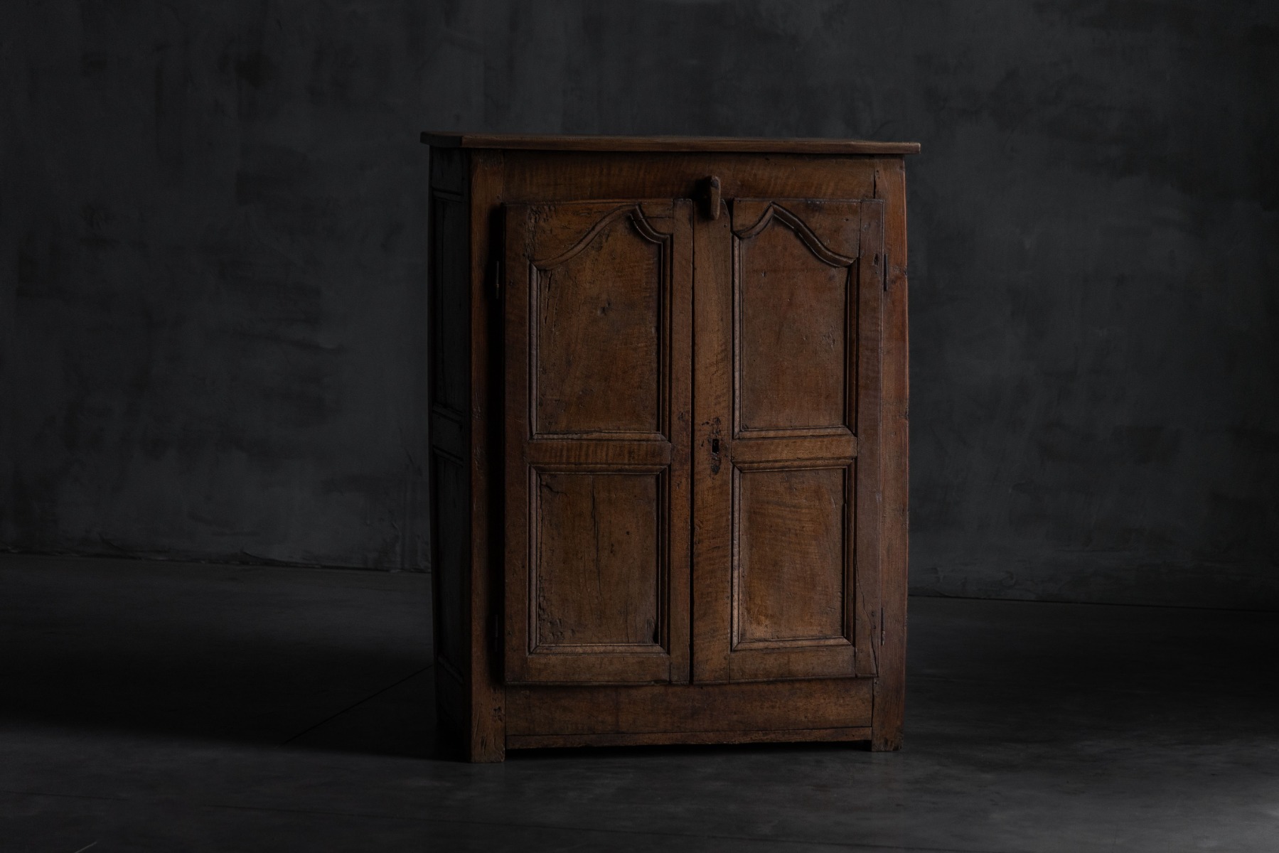 Handcrafted wooden cabinet reflecting vernacular craftsmanship