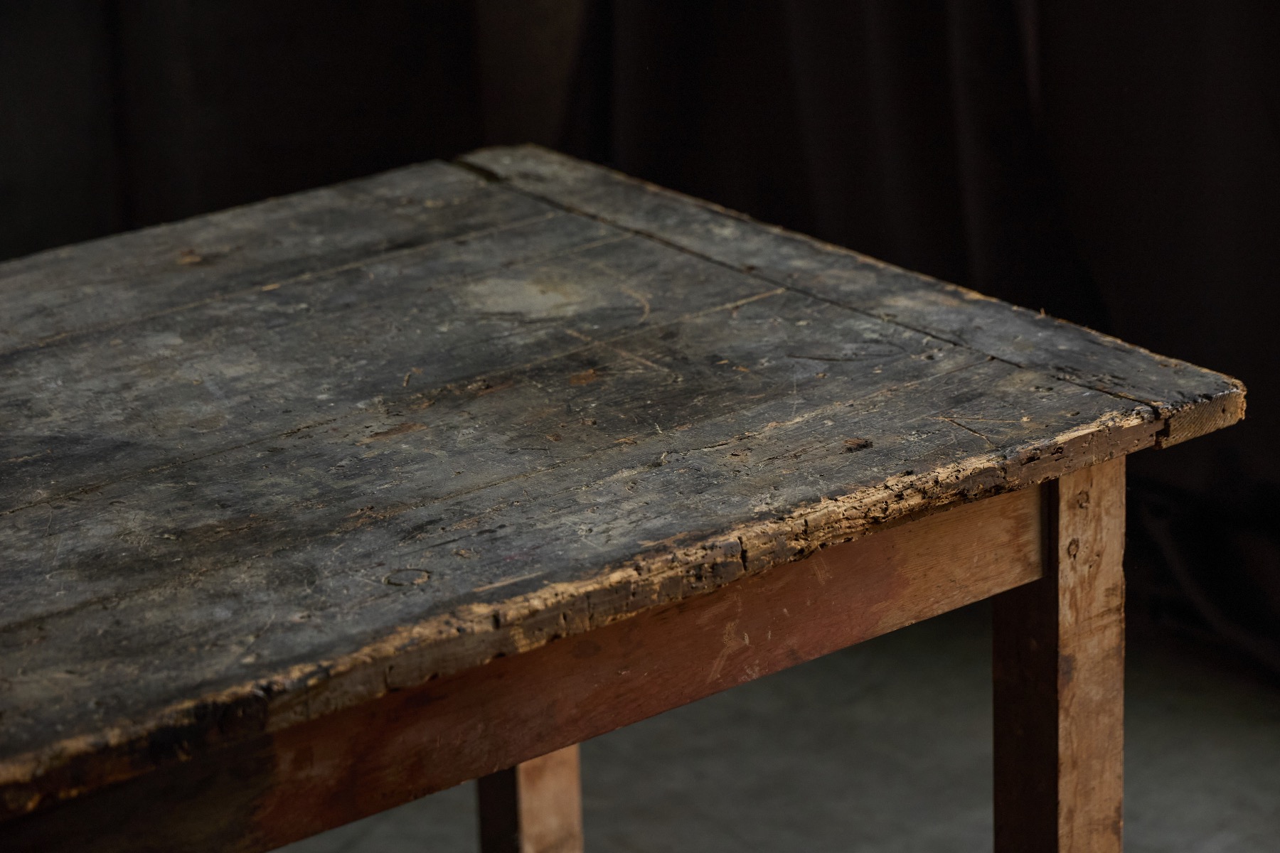 Vernacular primitive dining table with rural character