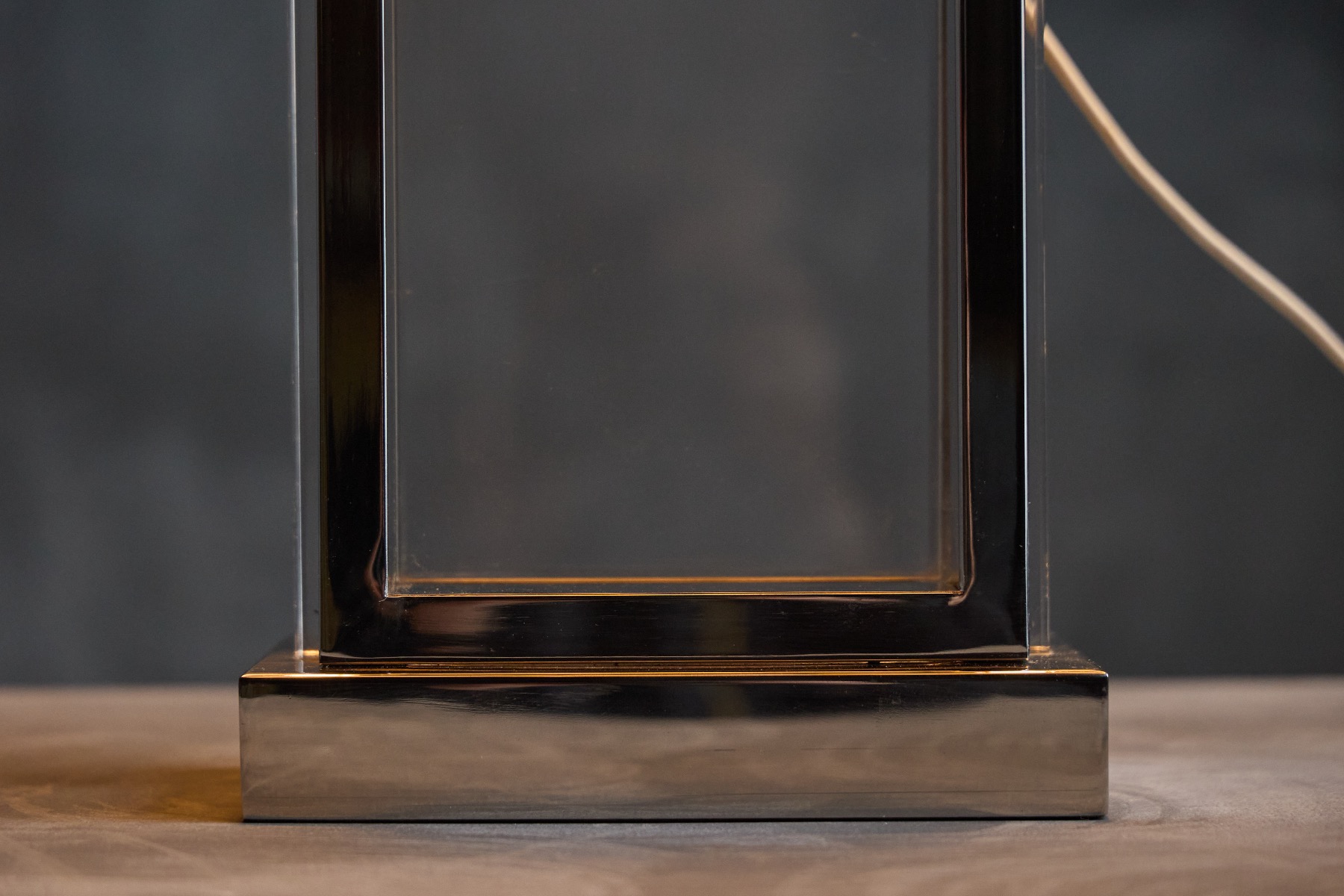 Sculptural table lamp with plexiglass base and chrome detailing