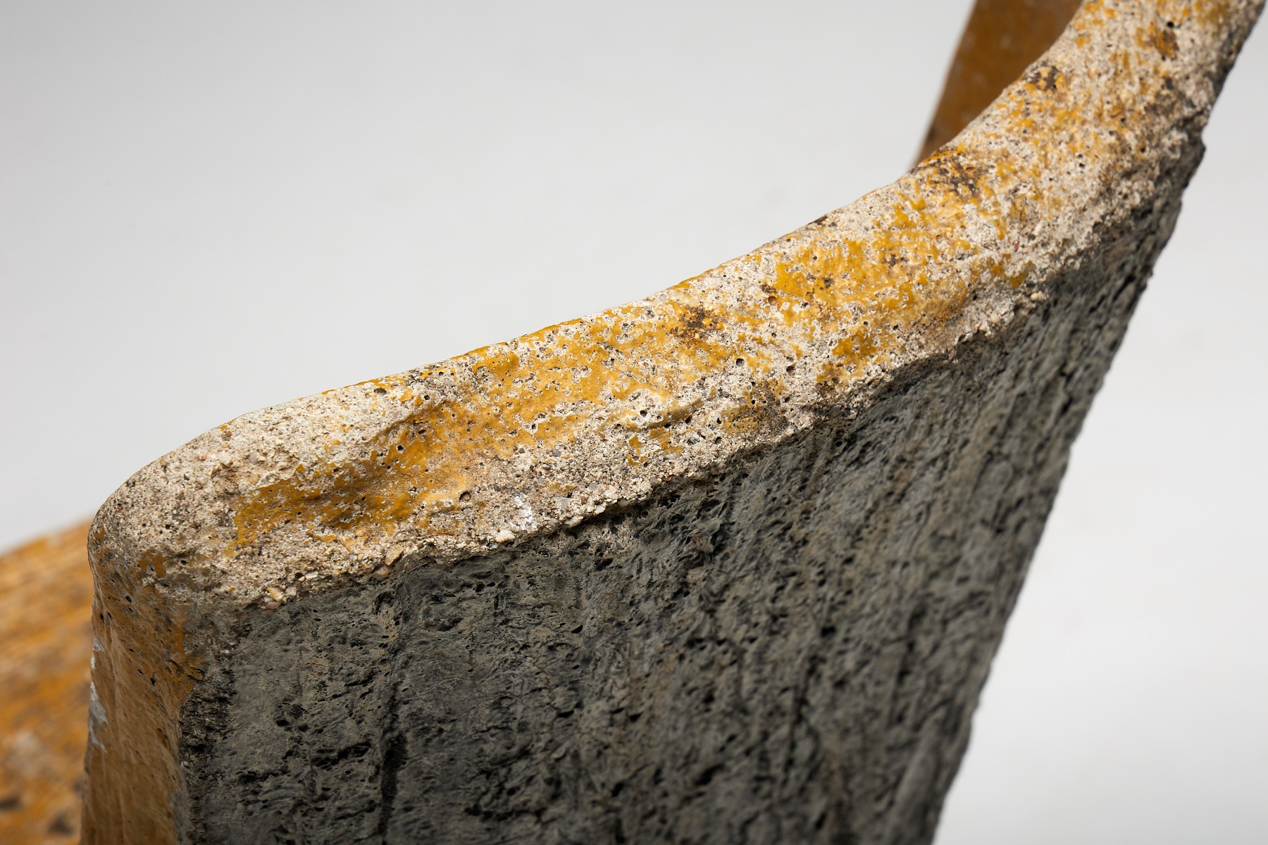 Raw textured concrete chair from the 1970s