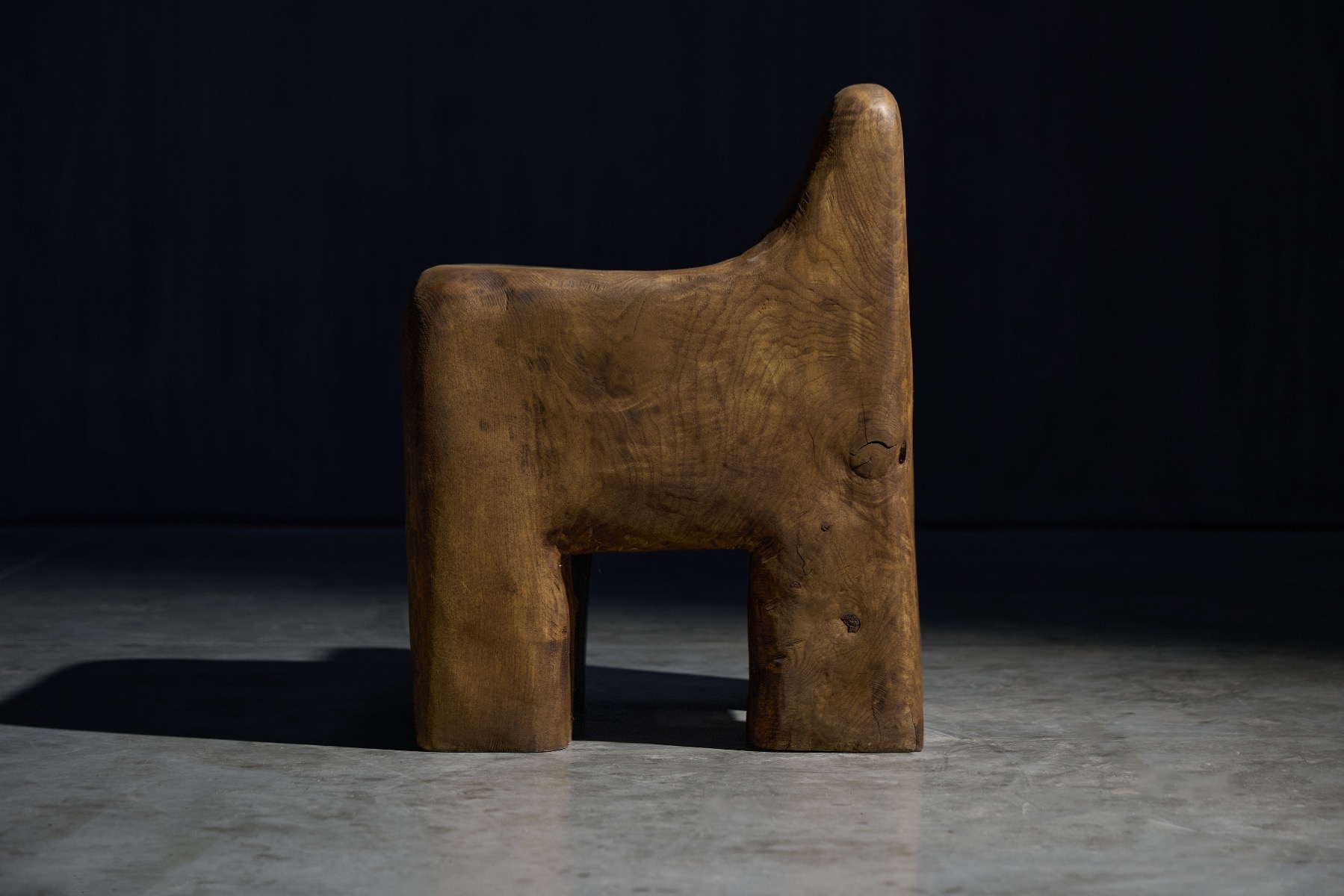 Architectural hand carved wooden chair from 2024