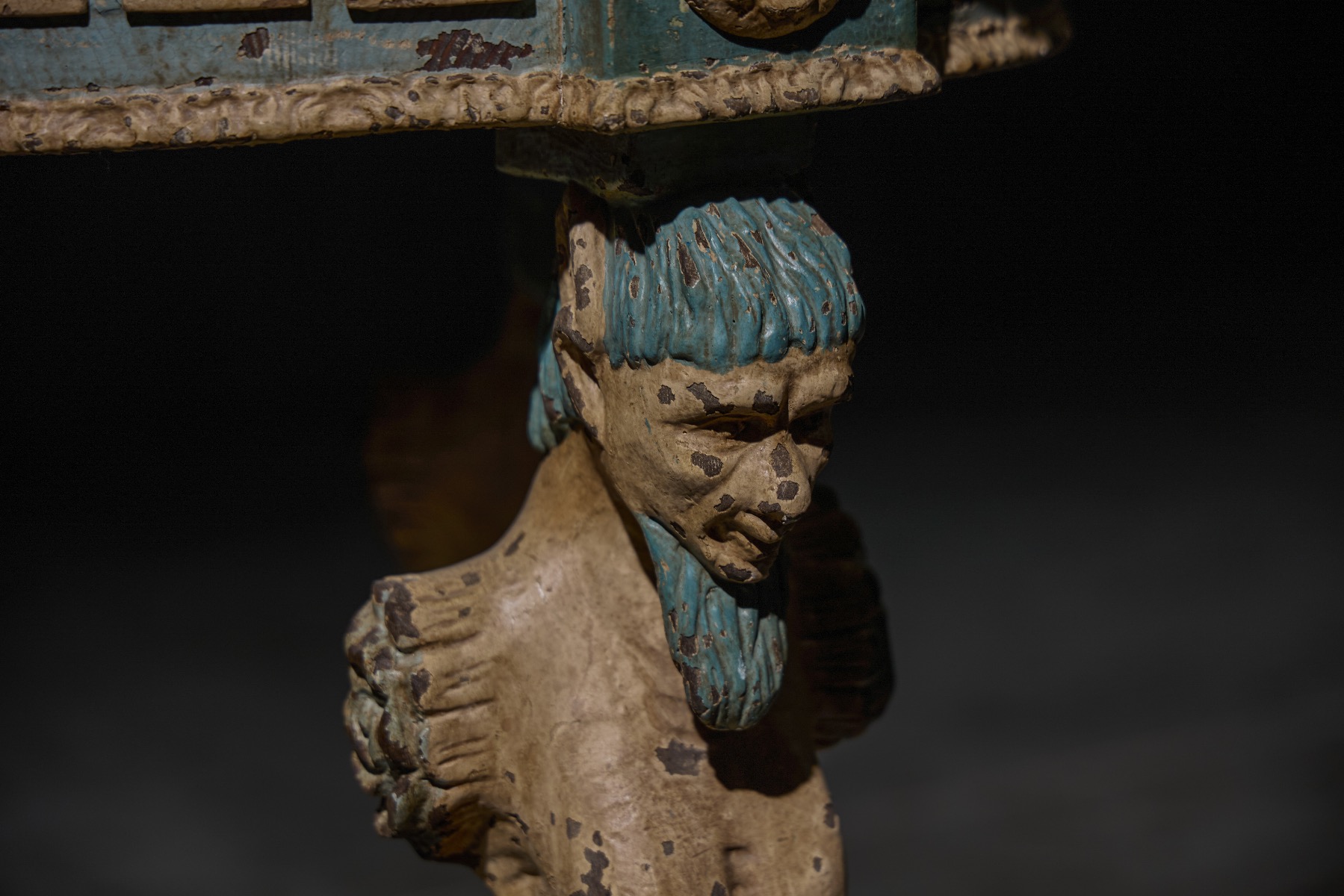 Carved satyr supported pedestal table from the 19th century