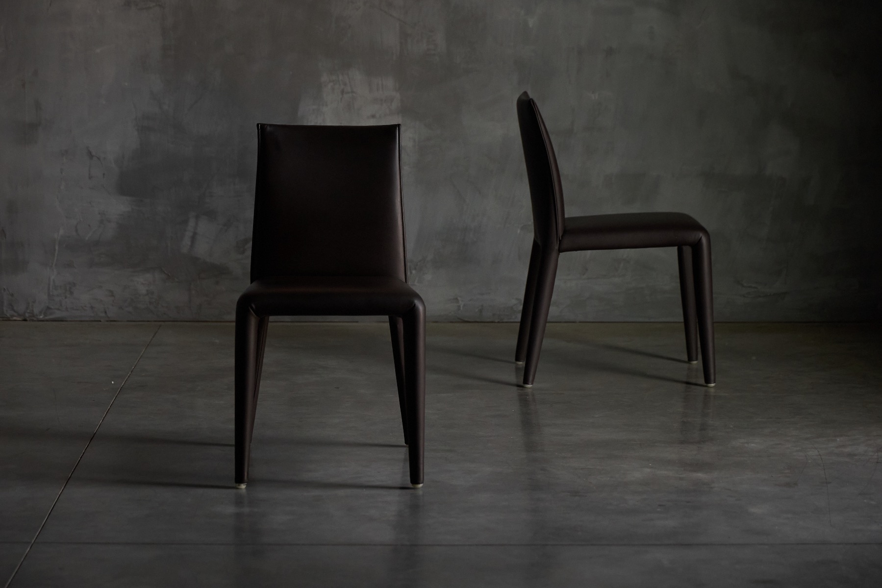Premium upholstered dining chair by B&B Italia