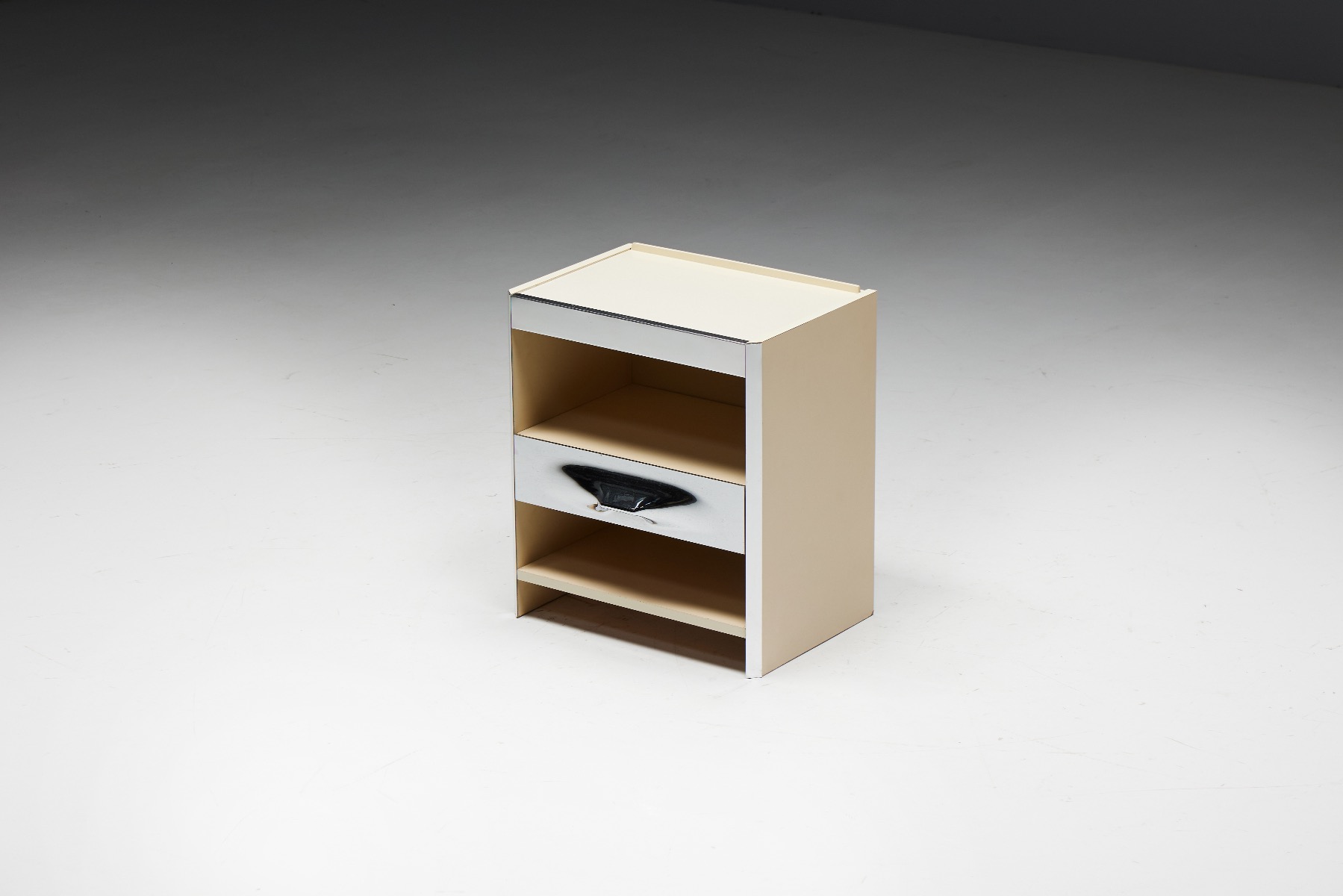 Designer bedside table by Raymond Loewy from the 1960s