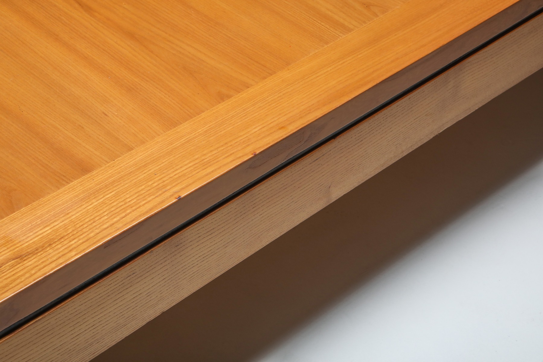 Designer triangular coffee table in elm from the 1970s