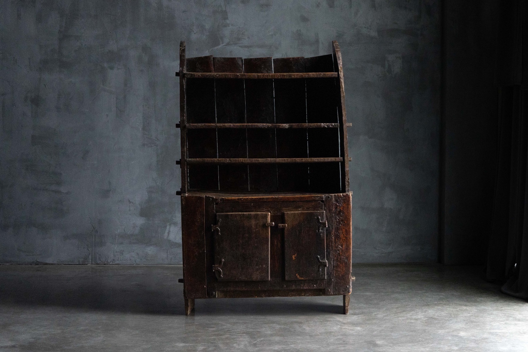 Primitive rural storage cabinet from the 1700s