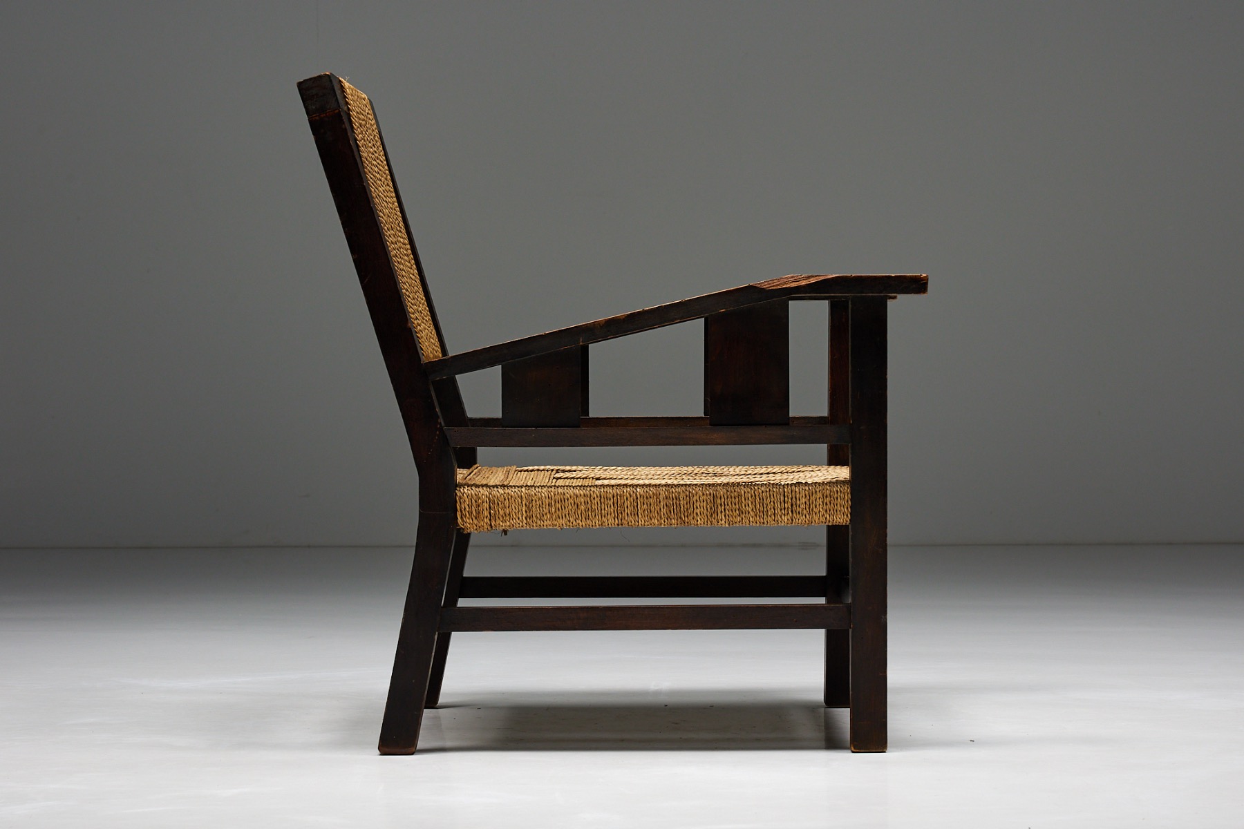 Early modern easy chair in solid wood with rope