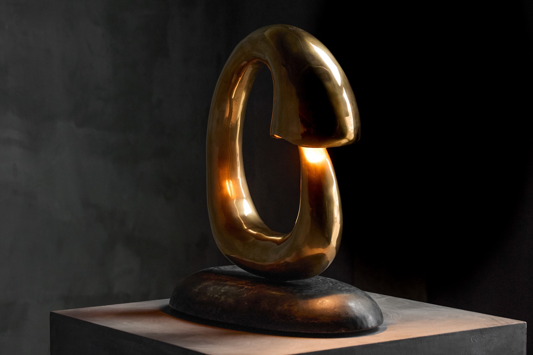 Modern bronze Angler light sculpture with expressive form